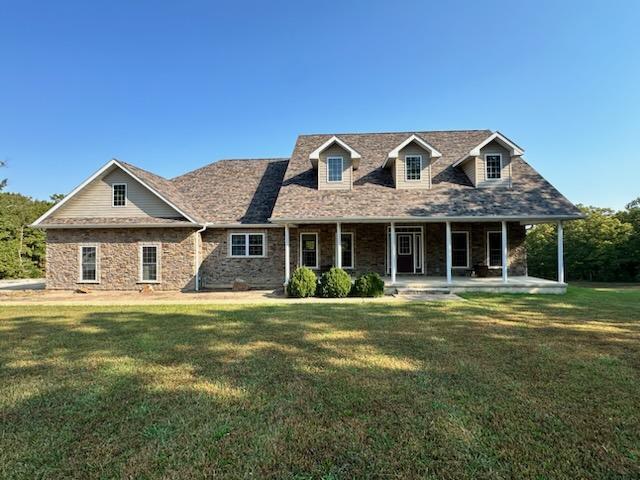 Back on the market due to no fault of Seller or home!!  Picture yourself in rural America on a private 15.61 acres m/l of gorgeous woods surrounding a meticulously maintained home w/ a spectacular stocked pond out your back door. This is a 5,164 sq ft 3 bedroom, 3 1/2 bath, 2 car oversized attached garage home that demands your attention. From the covered front porch, step into an open floor concept with cathedral ceilings, hardwood floors, cozy up to the  dual fuel fireplace, through one of the three patio doors, step out onto the expansive composite deck to relax and view deer and turkey in the backyard. For the cook in you, you will love the true cook's kitchen! With stainless steel upgraded appliances, propane cooktop, pot filler, generous island space, extensive kitchen bar, walk-in pantry. Master suite w/ tile walk-in shower, lg. walk-in closet, door to patio, 2 addition bedrooms, 1 1/2 bathroom and huge laundry with sink, built-in folding or craft table. Downstairs has walk-out features, is a large open space, family room , rec, room, or add more bedrooms full bath, and large workshop, w/garage door, covered patio, w/outdoor shower, New roof 4/24 Detached garage 30' x 40' w/electric, tall enough for an RV. Pond with fountain, stocked w/ bass, bluegill & catfish. Stunning property located close to major hiking, floating, and just plain enjoying life. A true must see.