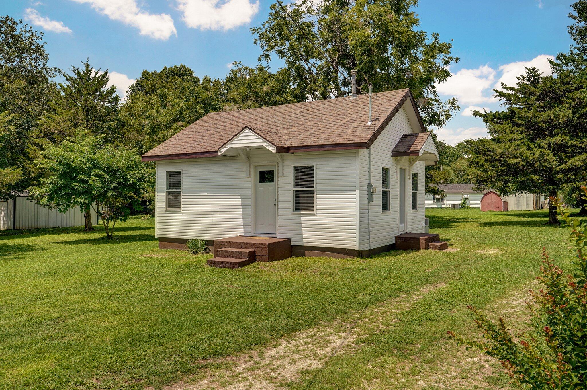 Check out this cute, updated home in the heart of Mt Vernon. Featuring all new windows, flooring, cabinets, counters, appliances and much more. There is a large storage building behind it and it was a large mature lot. Call today for a showing!