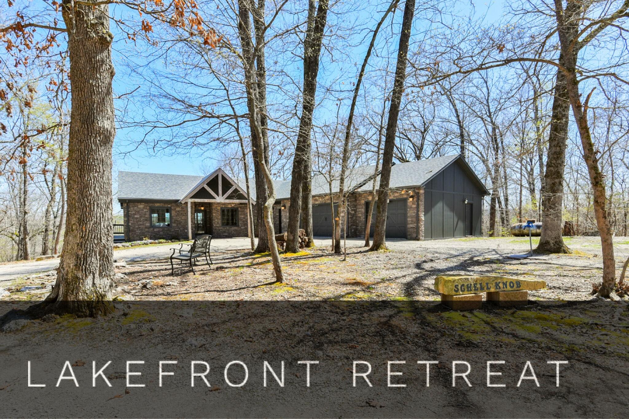 Your own private Table Rock Lakefront getaway!   The most peaceful meandering driveway through the woods leads to a secluded beautiful lakefront home.  This is a custom built home and quality throughout!  James Hardy siding,  slate flooring, custom cabinets and hardwoods, elegant fixtures...just to name a few of the quality details.   Walk in the front door to an open concept living, kitchen, and dining area.  Several large windows and 3 skylights give this area an amazing amount of natural light!  Oh and then there is the beautiful water of Table Rock as your backdrop.  Main level has master bedroom (with a large walk in closet), another bedroom, mud room off garage with washer and dryer, and 2 full baths. Downstairs has that open feeling too with a large wet bar area and living area.  This is awesome space!  You could easily put a large table there, pool table, ping pong table, shuffleboard table, bunk beds.... in addition to a sectional!  Think of summer holidays with the whole family down!! Three more bedrooms downstairs (2 non-conforming, no windows), and another full bath.  Both living areas have gas fireplaces making those spaces super cozy when its chilly.  Now to the outdoor space!!  Expansive covered, screened deck off the main level.  This runs the length of the house and only adds to the living space of this home.  The basement also has a walkout patio.   Plenty of room out back to set up those corn hole games. Let's talk lake.... This house has a shallow COE line.  The lucky new owner could do more clearing and open up the view even more if desired.   Then we have those 2 slips just below the house for extra $$.  This is a 8 stall community dock so the new owners could possibly  have 1/4 of the dock!   This is a great water location because Campbell  Point and Shell Knob are close by and Kimberling is an easy ride to the East.
