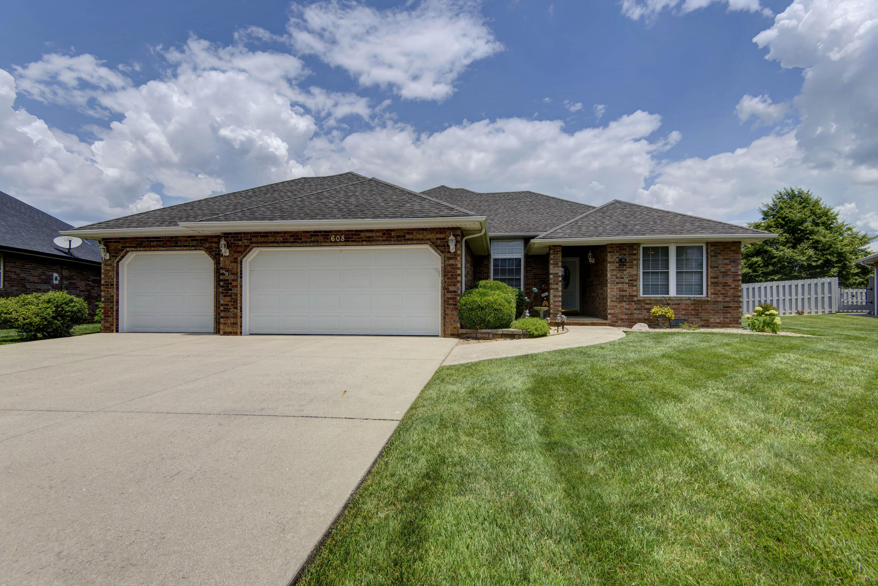 All you need on one level!  All brick beauty in Wasson Subdivision.  Split 3 bedroom, with 2.5 baths, two living areas, formal dining, 3 car garage.  Manicured to perfection this home has been well loved and it is evident from the curbside!  Enjoy irrigated lawn, with fenced in backyard, and a beautiful covered patio.  Lots of bonuses too, with tons of storage, granite counter tops, breakfast bar, pantry, crown molding throughout, and central vac system.   Turn key opportunity in the highly desirable Wasson subdivision.