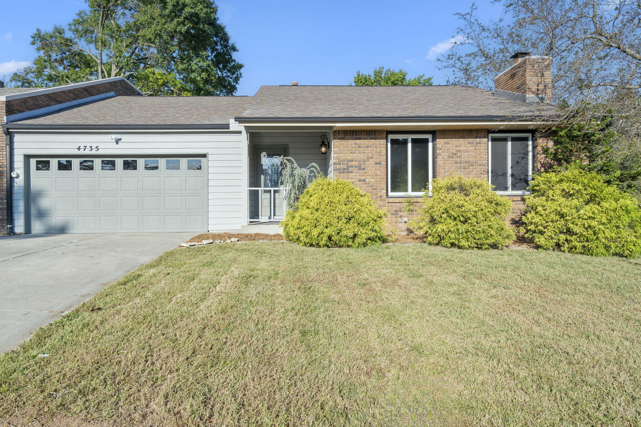 Updated 2 bed/2 bath patio home in the highly sought after Kickapoo School District. Located in Lakewood Village near Lake Springfield, this property offers a spacious floor plan, vaulted ceilings, new appliances, a newer roof (2020), updated light fixtures, and more!  The curb appeal has been enhanced with fresh paint and an updated garage door. Inside, enjoy a front living room with hardwood floors, built-ins, and a gas log fireplace. The kitchen features new granite counters, high-end stainless appliances w/ a gas range, a skylight, breakfast nook, pantry, wet bar, and separate dining area. The primary bedroom provides a stylish ceiling fan, bathroom with dual sink vanity, walk-in shower with modern sliding glass doors, and a large walk-in closet. The 2nd bedroom has a walk-in closet and nearby hall bathroom with shower/tub combo. At the back of the house is a den space that makes a perfect 2nd living room or office. Lakewood Village offers  new fiber optic internet service, a community swimming pool, club house, playground, trash service, and tennis courts!