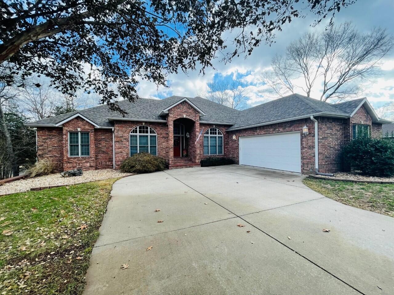 One of the rare finds currently on Table Rock Lake that has all of the following: A true Lake Front home within a hundred feet or so to the lake. Year round lake views. Boat dock behind the house with a slip and lift. The perfect setup for lake living! With this home you will find many improvements such as a new roof, new grinder pump and upgraded countertops, just to name a few. Other features include a large kitchen, an oversized screened in deck,  basement with game room and living room. This is the perfect house for friends and families to enjoy all the incredible things that lake living offers....Seller nor broker have verified any sizes. All sizes provided are estimates. Buyer and buyers agent to perform own due diligence regarding square footage.