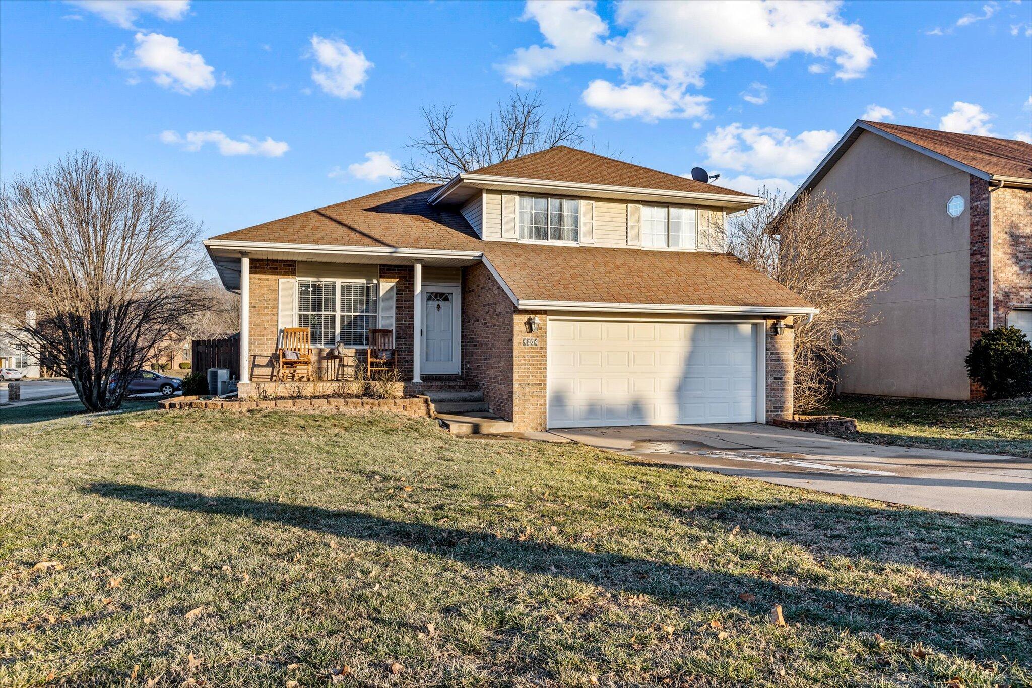 Discover the epitome of modern living in this stunning 3-bed, 2.5-bath split-level home. Located in the desirable Southwest Springfield within Kickapoo school district and close proximity to highway access. This home is nestled on a corner lot with a large, fully fenced, backyard including a large deck, spanning the whole house for all outdoor gatherings. This home has a large open kitchen with plenty of cabinet space, dining room, separate utility room with newly added storage features and a half bath perfect for guests, and a large, recently remodeled family room that includes built-in shelves and a fireplace making this home perfect for both relaxation and entertaining. There are new lights in almost every room with tons of natural lighting throughout. Complete with a two-car garage that has built-in storage to the walls, this residence seamlessly combines style and convenience for your ideal lifestyle. There are so many things to love with this move-in ready home! Schedule your private tour today!
