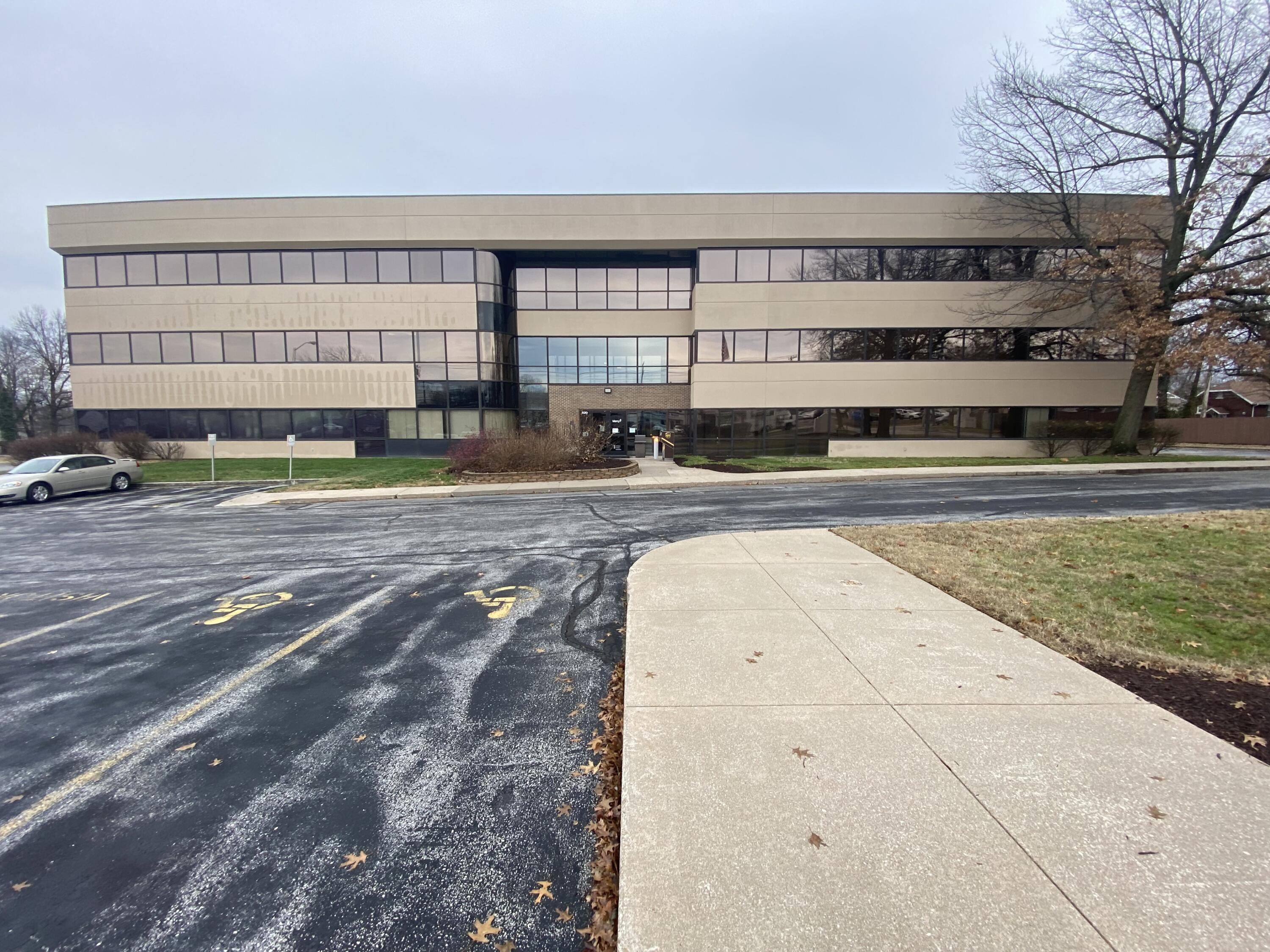 Free standing 3-story office building on highly visible Glenstone Avenue. Excellently positioned in Southeast Springfield Office Retail quadrant. This 47,477 m/l sf office building has 3 floors of a semi open style cubicle configuration, perimeter offices, multiple conference rooms, employee lounge, break room, elevator, multi-stall restrooms. Excellent primary frontage with multiple curb cuts. Large L shaped lot of 3.55 acres with additional access out to Cherry Street. Paved parking of 238 spaces exceeds most all office uses. Zoned General Retail for most commercial uses. Deed Restrictions will apply upon sale. Property sold ''AS IS'' with right to property inspection.