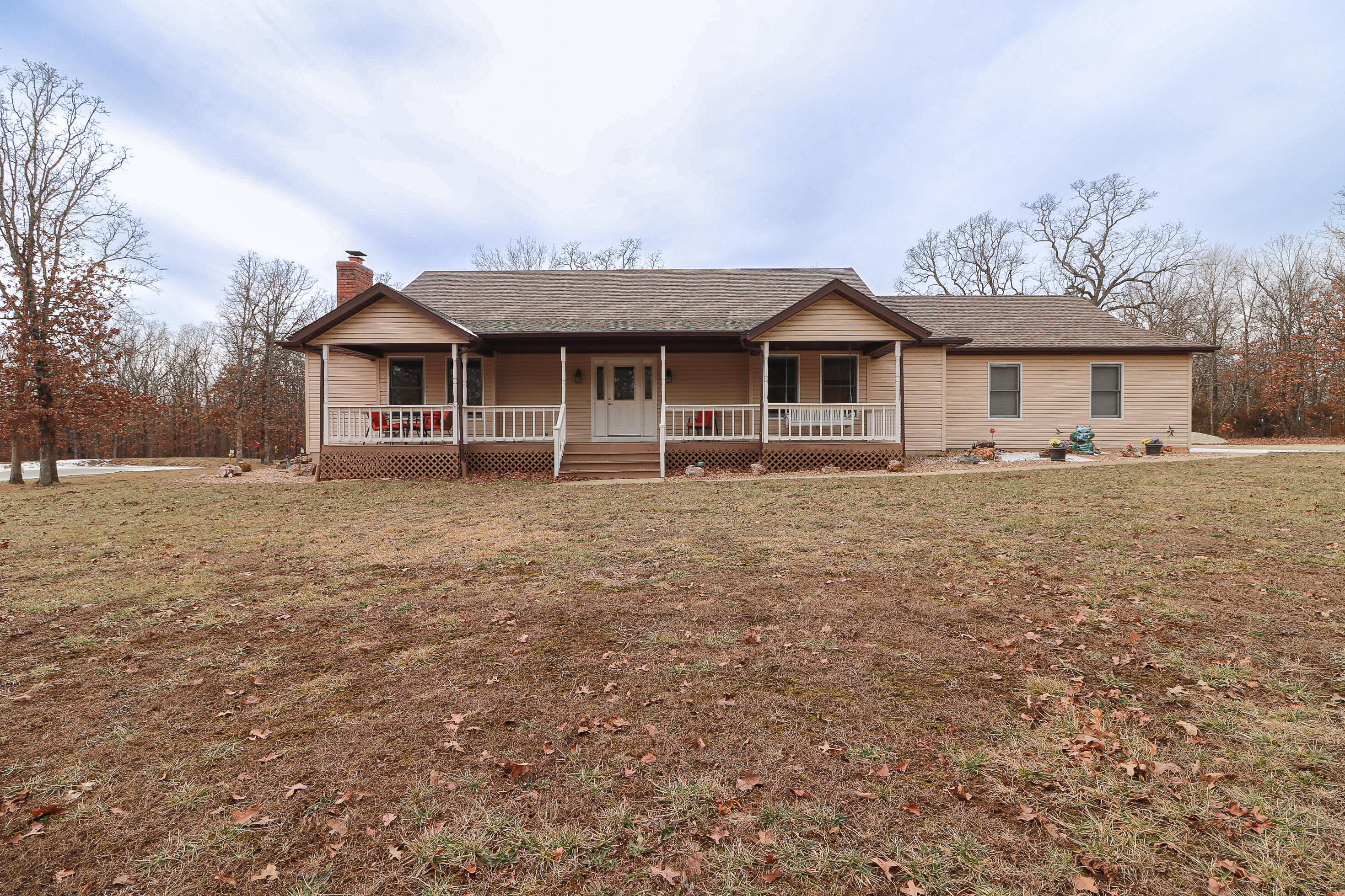 Welcome to your dream hunting retreat! This meticulously maintained 80-acre property offers the perfect blend of comfort and adventure. Nestled within the serenity of nature, this home features 3bedroom, 2bathrooms with an unfinished basement, providing endless potential for customization. The master bedroom is spacious with a large en suite bathroom with a jetted tub and walk-in shower. The heart of this home is the custom kitchen, boasting roll-out cabinets, a large pantry and granite countertops. A bakers dream. The open-concept living space has a cozy fireplace, creating a warm and inviting atmosphere for gatherings with family and friends. For outdoor enthusiasts, this property is a hunter's paradise. The hunting land is predominantly timber, with established trails that allow great stand access.  The land is complemented by well-thought-out food plots strategically placed with elevated blinds for the optimal hunting experience. Abundant deer and wildlife populate the area, especially the front yard, making it a haven for nature lovers. A spring-fed pond adds a picturesque touch, providing a tranquil spot to relax and unwind. The view from the porch is stunning! The 40x30 shop, complete with an RV carport, is perfect for storing equipment and vehicles. The privacy of this location is unparalleled, with a long driveway ensuring seclusion.Whether you're an avid hunter or simply seeking a peaceful home surrounded by nature, this property is one you don't want to miss.