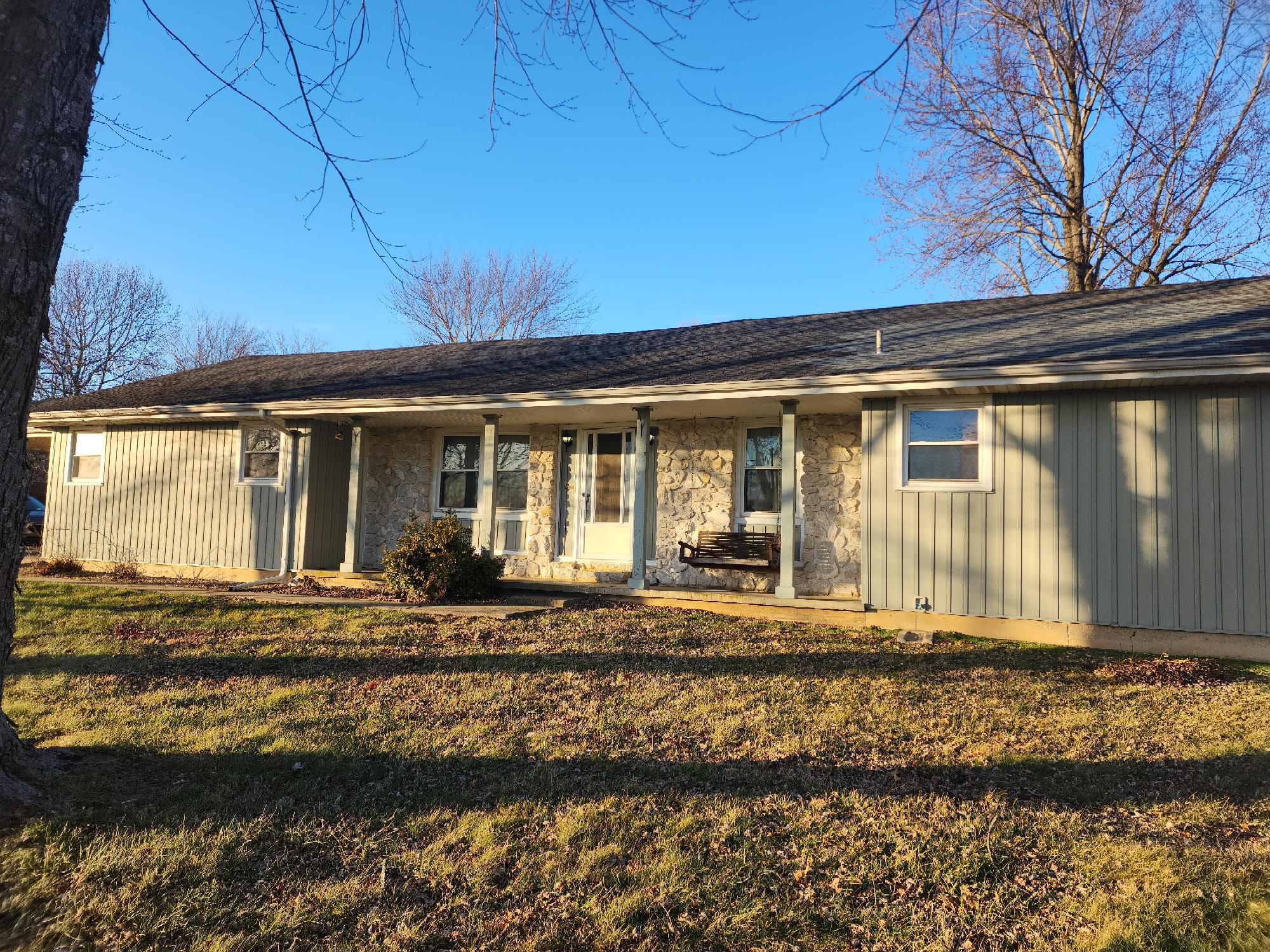 This home sits on a BEAUTIFUL oversized corner lot. Located just outside city limits north of Springfield. 3 bedroom 2 baths and has a nice sized laundry room and a mud room. The property also has a shop/two stall garage with electric and 1/2 bathroom. This home sits on a dead in street and easy access to HWY 65.