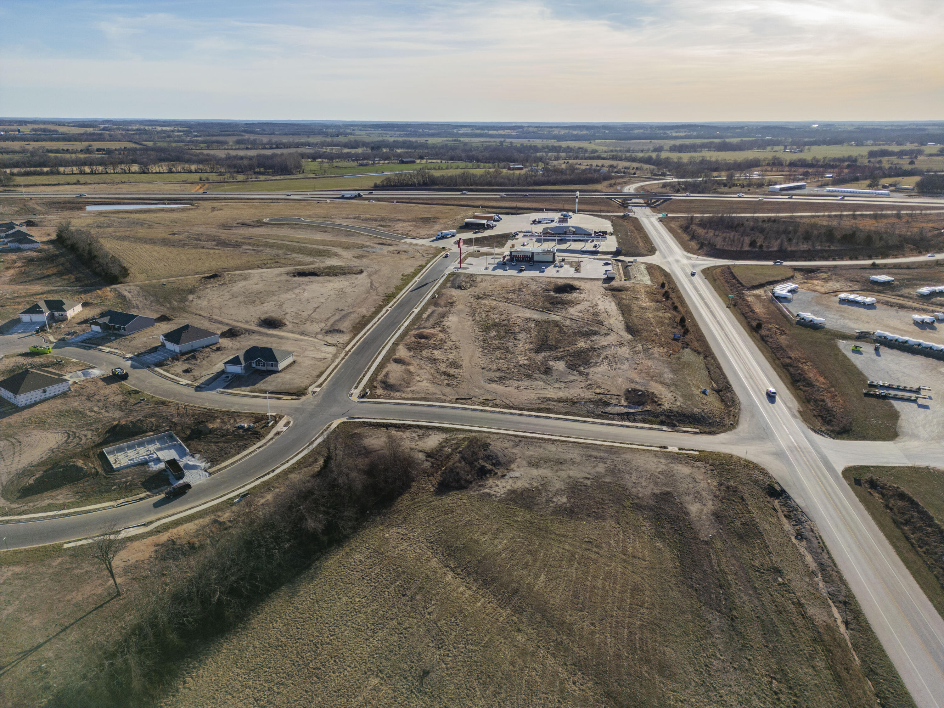 This piece of prime property is a perfect place to start or relocate your business. With highway 13 footage, high traffic neighboring businesses and new residential subdivisions behind the property, this is one of the best locations in Bolivar. The property adjoins a paved street, has underground power, and city water and sewer.