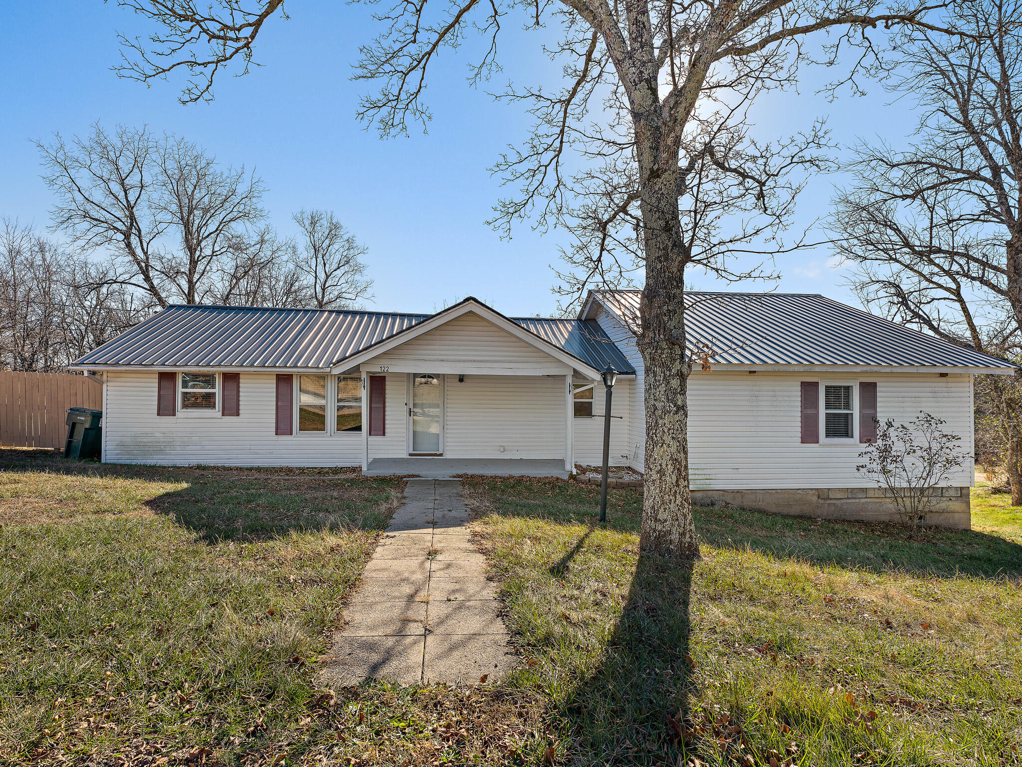 ACREAGE!. Now available, is this charming country home on 1.35+/- acres. This property features many interior improvements with newer flooring, kitchen updates, large master bedroom/walk-in closet and recent bathroom updates. Even with this homes great interior some of its best attributes await outside. These attributes include a quiet, sprawling property with excellent paved road access, mixed cleared/wooded landscape, privacy fenced yard and a great detached garage/outbuilding. Very rare opportunity to own unrestrictive acreage affordably.