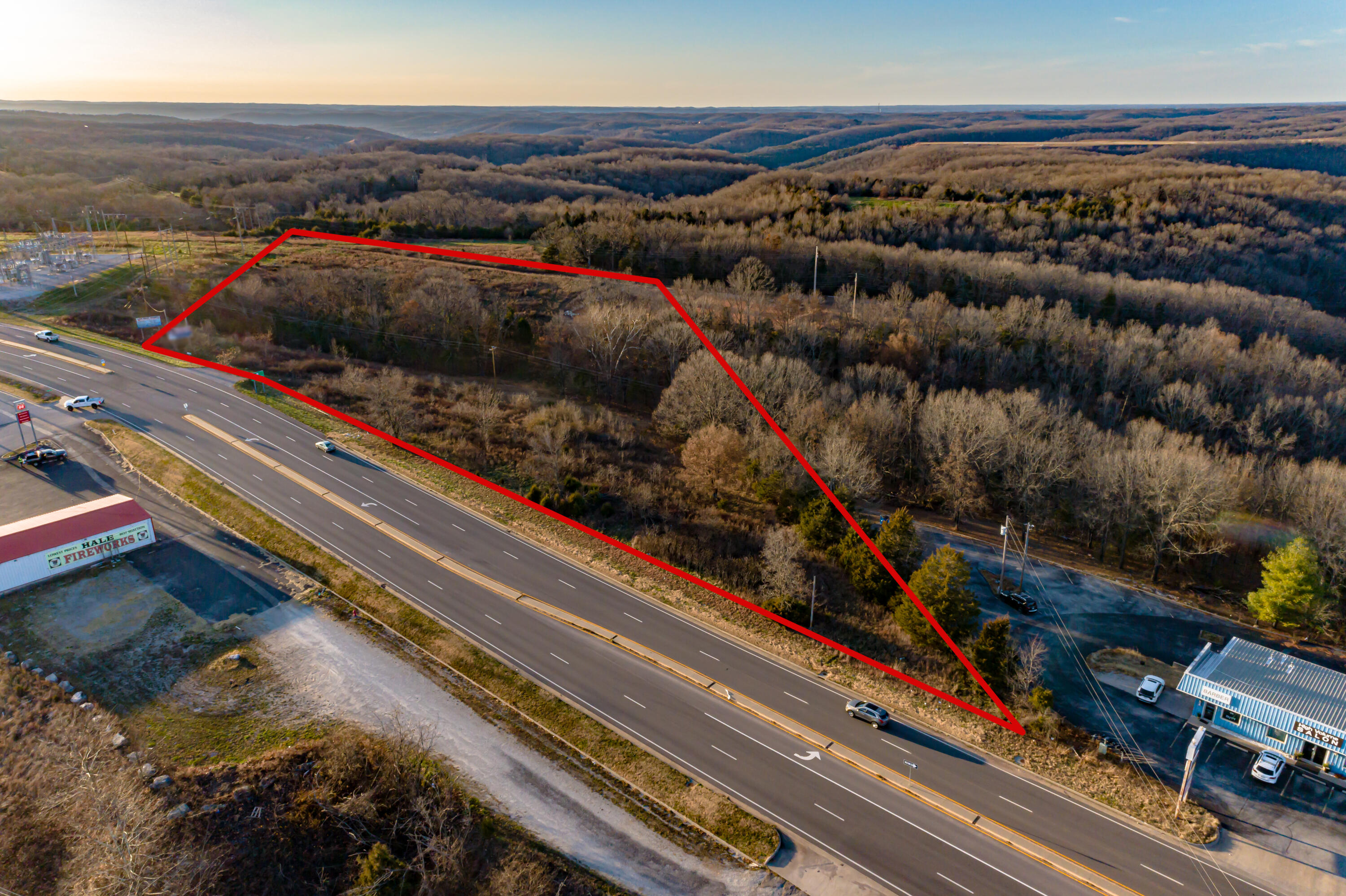 Commercial land that fronts on the west side of Highway 13 and lies north of the intersection of Hwy 13 and DD in Branson West. Approximately 4.6 acre tract with more than 600 feet of frontage on Highway 13. More land is available if a larger tract is needed and this tract could be divided. Sale subject to Stone County Planning and Zoning subdivision approval and seller reserves 60 ft wide easement across property for roadway and utilities.