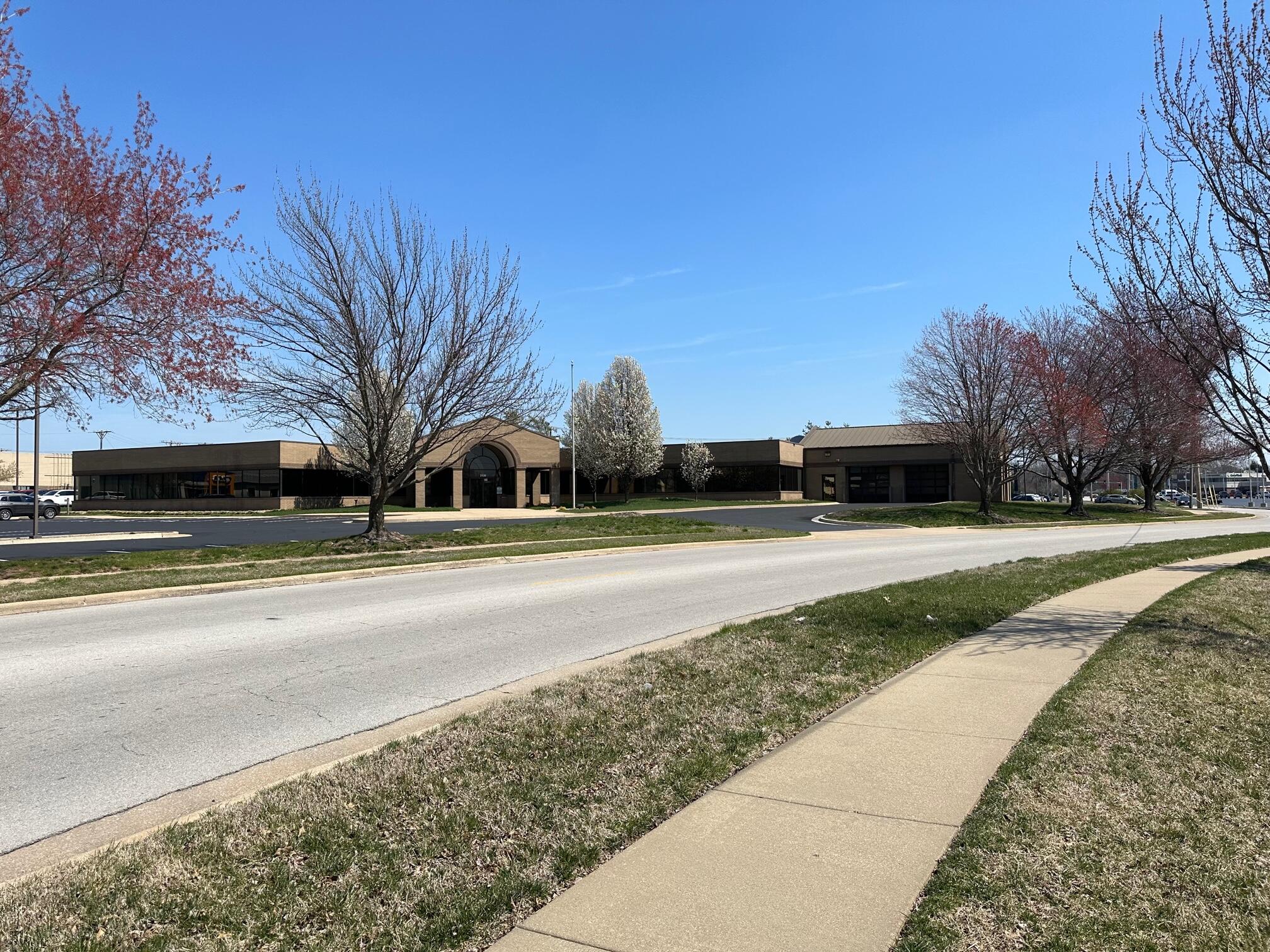 3130 S. Delaware Ave., Springfield, MO. - Finished office space with 2 large training rooms, computer room, break room with outside patio. Great location.