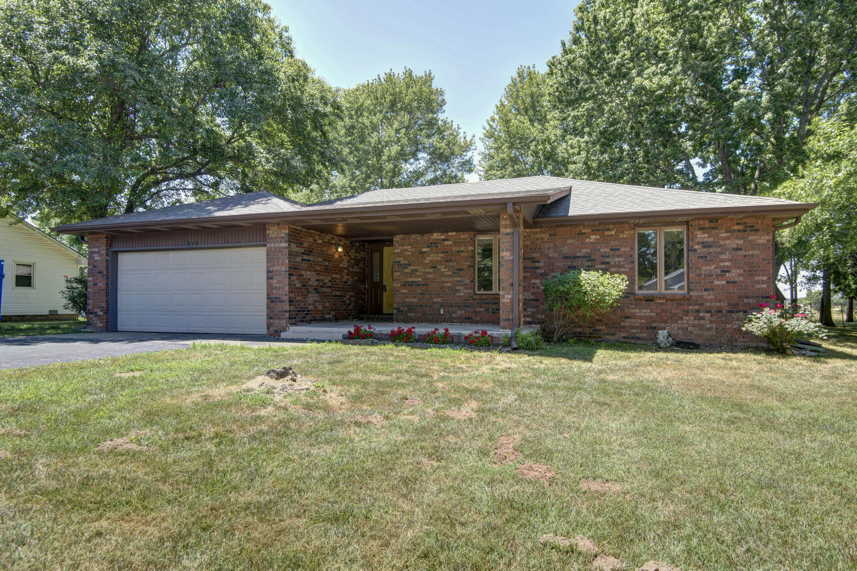 Check out this ALL-BRICK beautiful 3 bedroom, 2 bathroom home! Located in the heart of Sparta, this home has no neighbors behind you! Walk into the front door and immediately you'll notice the warmth of the home with the spacious living room, the beautiful rich hardwood floor and the brick pellet stove. The hall bath has been remodeled with a large walk-in shower and plenty of space! The bedrooms are a good size with wood shelving in the closets. The master bathroom has a handicapped accessible shower/tub combo and a huge walk-in closet! The kitchen has so much counter space and a newer stove, dishwasher and fridge included! The roof is only 3 months old! Call today for your showing!