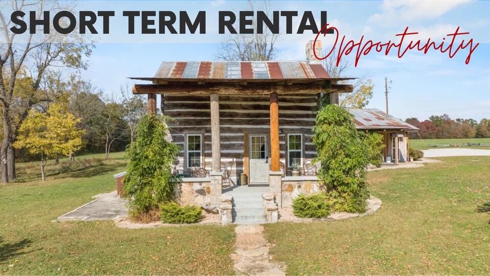 SHORT TERM RENTAL OPPORTUNITY NO HOAWelcome to your new retreat, this gated 43+/- acre property lies a mere half-mile from the shores of Table Rock Lake and the conveniences of town. Nature enthusiasts will appreciate the 2 stunning streams running through the property, adding to its uniqueness. Trails wind through the woods that you can explore with your ATV. Originally constructed in 1910, the spacious 3-bedroom,(2 non conforming), 2-bathroom hand-hewn log home underwent meticulous restoration in 2019. A seamless modern addition now harmoniously coexists with its timeless charm, offering all the contemporary conveniences you desire. The residence boasts an oversized 3-car garage, two expansive living areas, and an inviting open concept layout. The second living area features a well-appointed kitchen and dining space with wooden live edge countertops, a farmhouse sink, ample storage, and captivating light fixtures, creating an intimate ambiance for family gatherings. Upstairs, an oversized versatile bedroom suits various purposes, from a home office to a creative studio. The master suite is a true sanctuary, featuring a full bathroom with a walk-in shower and generous closets for your belongings. Located off the garage, a sizable mudroom with washer and dryer connections ensures convenient laundry care. This unique property awaits your ownership and comes fully furnished, including TVs and sound bar. It's a one-of-a-kind gem that's both thoughtful in design and rich in natural surroundings and history. Discover your ideal secluded retreat or investment opportunity on this rural property, all while being moments from the grocery store. Enjoy the best of both worlds.Schedule a visit today.