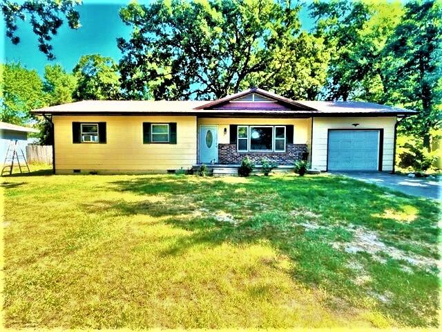 Great starter home with a large back yard with privacy fence!  Home is 3 bedroom 1 bath with a large living room.  1 car attached garage.   Home has vinyl plank flooring throughout.  Located in a quiet neighborhood.  Come take a look!