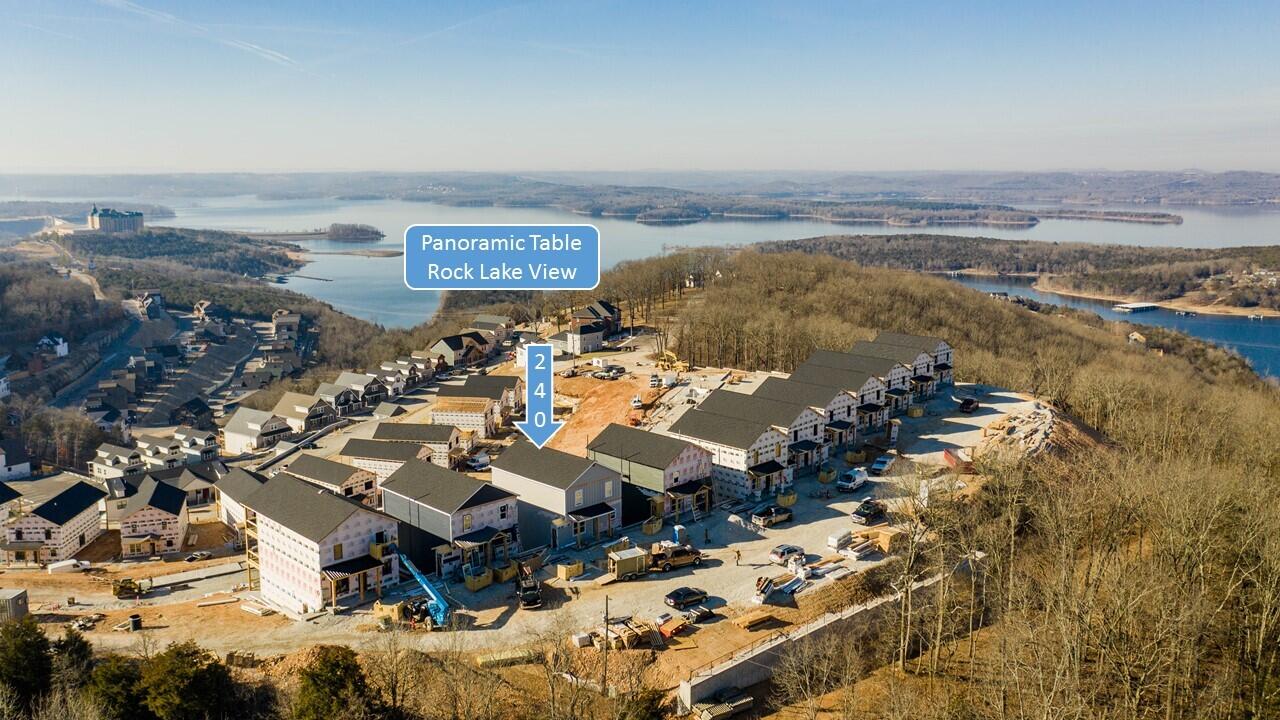Check out this Table Rock Lake view from one of the highest elevations in Taney County! Not only will you have an amazing view of the lake, you'll have a fantastic view of fireworks over Chateau on the Lake. New construction located in the Chateau Mountain North Complex.  This complex has been approved by Taney County to be used as Nightly Vacation Rentals, so whether you're looking for a great investment, or your own personal getaway, this is the perfect place for you. This property is being sold unfurnished & undecorated and it will have a 1 year Builder Warranty when complete. The lodge will offer 9 bedrooms, with 1 being a bunk/bonus room and 9 full baths so there's plenty of room for everyone. It's conveniently located to downtown Branson for plenty of entertainment, shopping and dining; and Silver Dollar City is only 10 minutes away!  (Finished photos are of a similar property) (Amenity photos are from Chateau Mtn. across Gunner Hill but will be similar). Property taxes are only on lot as build hasn't been assessed yet.