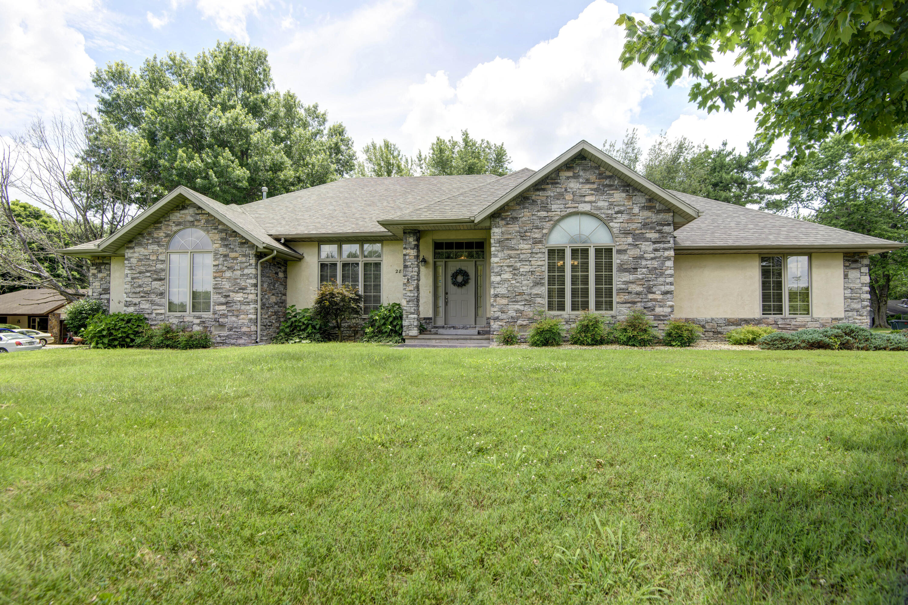 Welcome to 2826 West Munhollon Lane. this IS the home you have been anxiously awaiting to come on the market!This home is nestled on a dead end street with a country setting yet convenient to restaurants, entertainment,  shopping and hospitals. This quality home in Kickapoo School district offers a very open floor plan with 4 bedrooms, 3 bathrooms, formal dining room, fireplace, storm shelter and fabulous covered back porch area. You will enjoy entertaining on the patio this Summer with your friends & family and watching the wildlife.The roof is a year old with a transferable warranty.Put this home on your ''MUST SEE'' list before it is GONE!