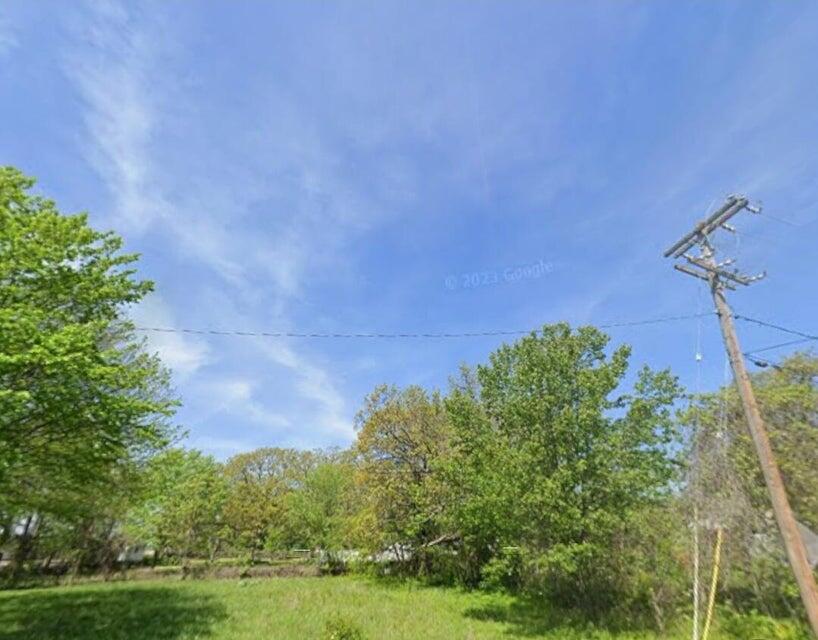 Lot is part of an estate being sold. Trustees have very little information in regard to the lot. A home was previously located on the site, but was taken down at some point. Zoned Commercial.