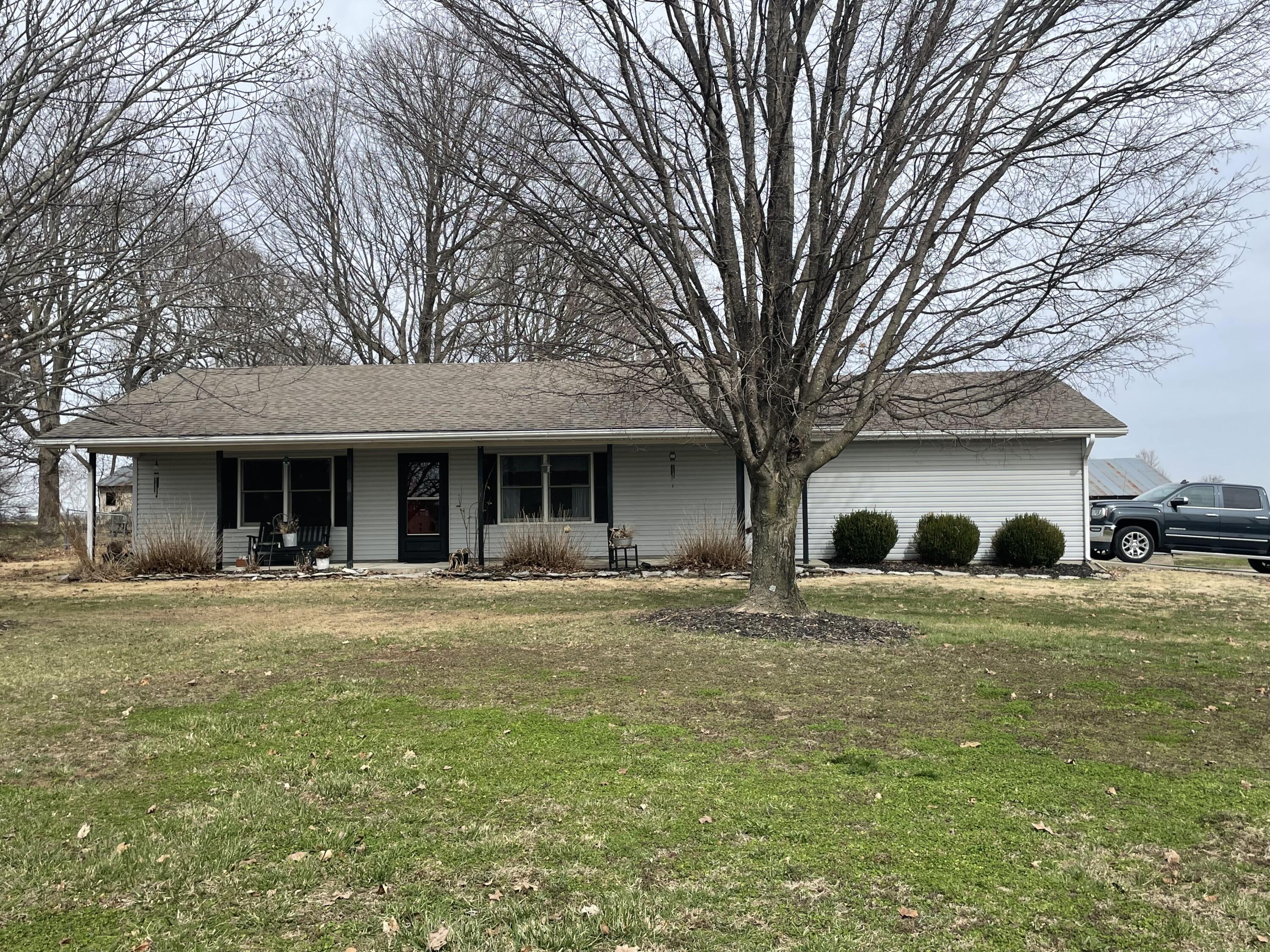 This is a must see!! A fantastic, very well kept home on a half acre, open floorplan, central heat and a walk in tub, fenced in backyard and a 20x30 shop! Easy access to Exeter or Cassville. The tools in the shop do not convey