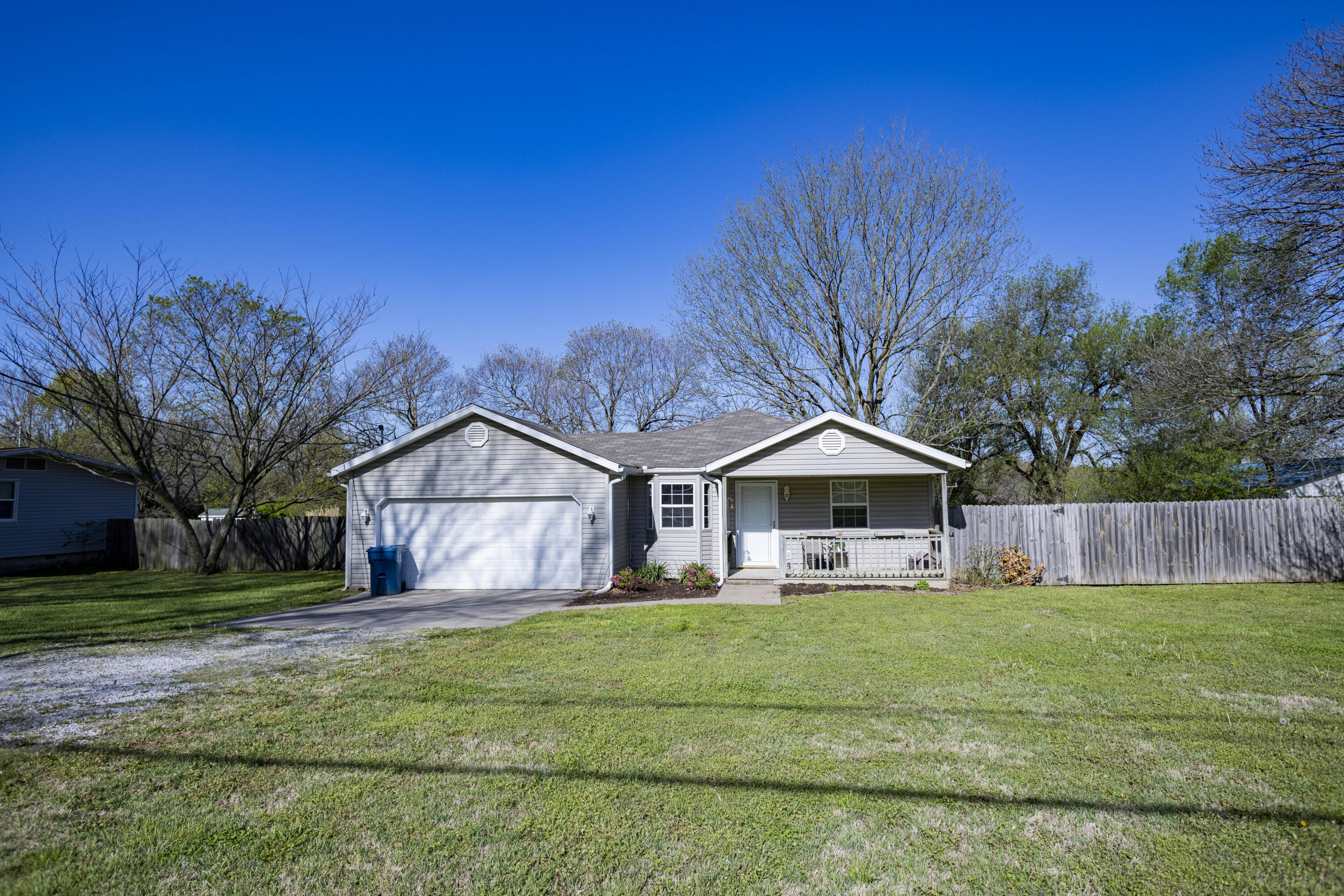 This ranch-style 3/2/2 home sits on a low-maintenance, 1/2 acre lot and was renovated in November 2018 with new windows, appliances, hot water heater, blinds and half of the front roof making it move-in ready for its new owners! Perhaps the best feature of the house is its park-like, fenced-in backyard framed with mature trees. Bonus points for this home is that it has low taxes due to having an Oronogo tax yet in Webb City school district. Call today for your private showing!