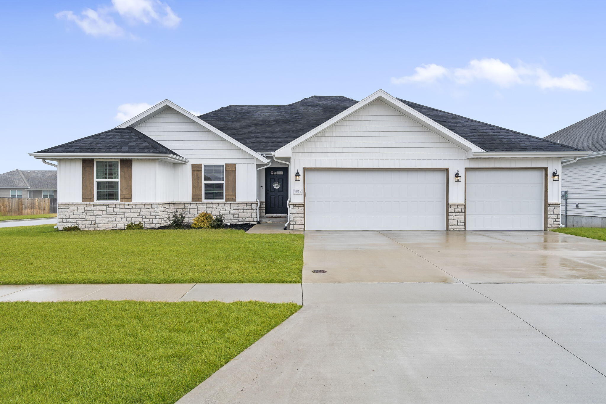 Welcome to 1912 S Lullwood Ave, Springfield, MO! This beautiful Bussell Built home was built in 2021, has 4 bedrooms, 2 bathrooms, and a 3 car garage, almost 1,900 SF of living space, has been beautifully maintained and is move-in ready! Located in the desired Millstone Crossing Subdivision, the property resides within the Republic School district and provides a short commute to Republic, MO, James River Expressway, West Bypass, shopping, restaurants, and other local amenities. Other highlights include a newer roof (2021), newer HVAC (2021), stainless steel appliances, engineered hardwood floors, granite countertops, and oversized custom, walk-in pantry, walk-in closet, covered back patio, and more! All nestled on a large .26 acre lot in a corner lot with a fully fenced in backyard, ready for all of your outdoor gatherings. This property is a must see!