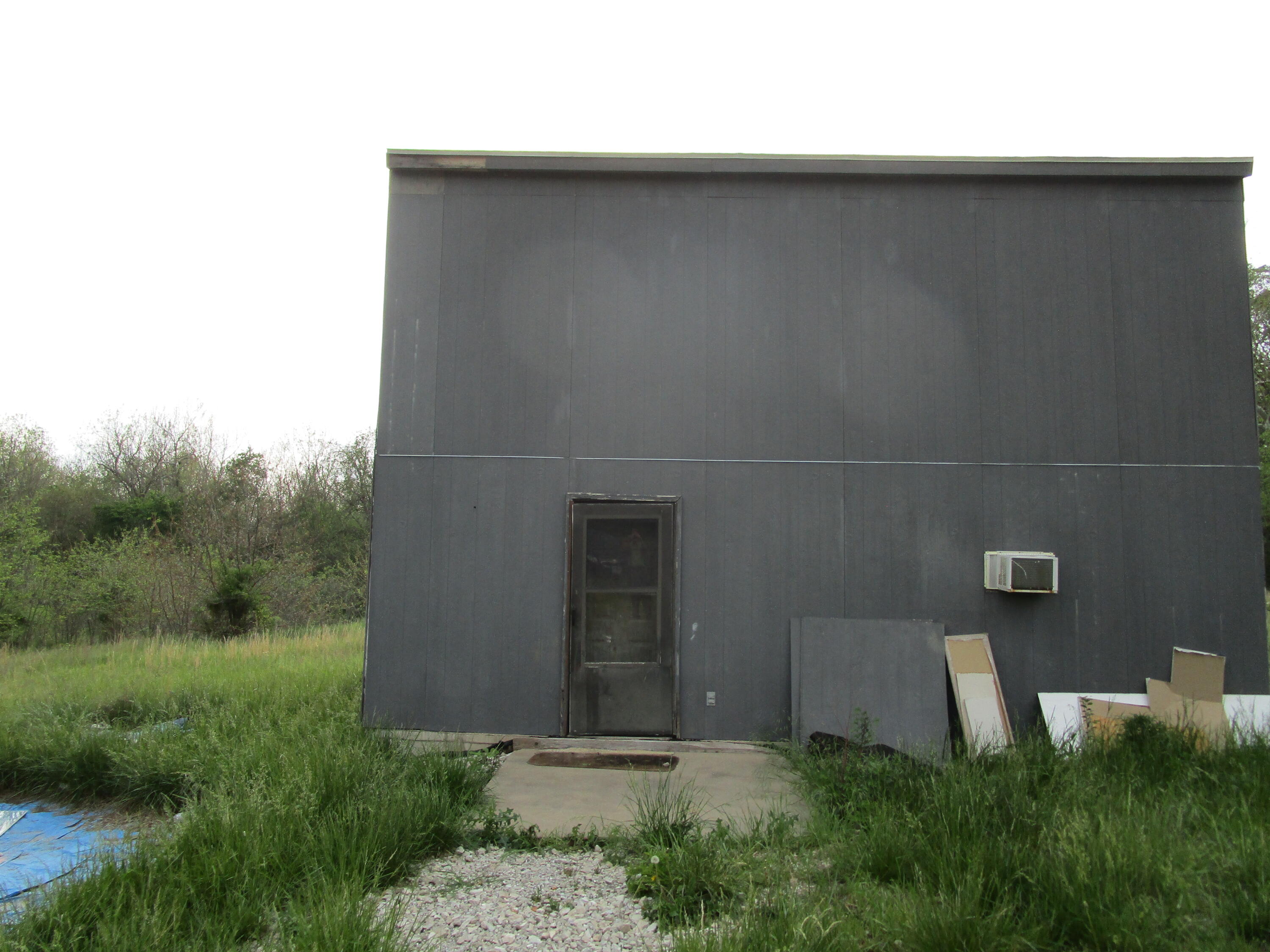 Something for the DIYer or dreamer. An unfinished house sitting on 5 quiet acres. The hard part of framing is already complete. The inside is open to your imagination to finish as you wish. A lot of wood flooring material, insulation and dry wall left in the house to use in finishing the house.Does have one finished bathroom on first floor but there is another unfinished area on the second floor that could be made into a bathroom.3 bedrooms upstairs and a 4th room downstairs that could be converted into a bedroom.With 5 acres there is plenty of room to make this property into whatever you want.
