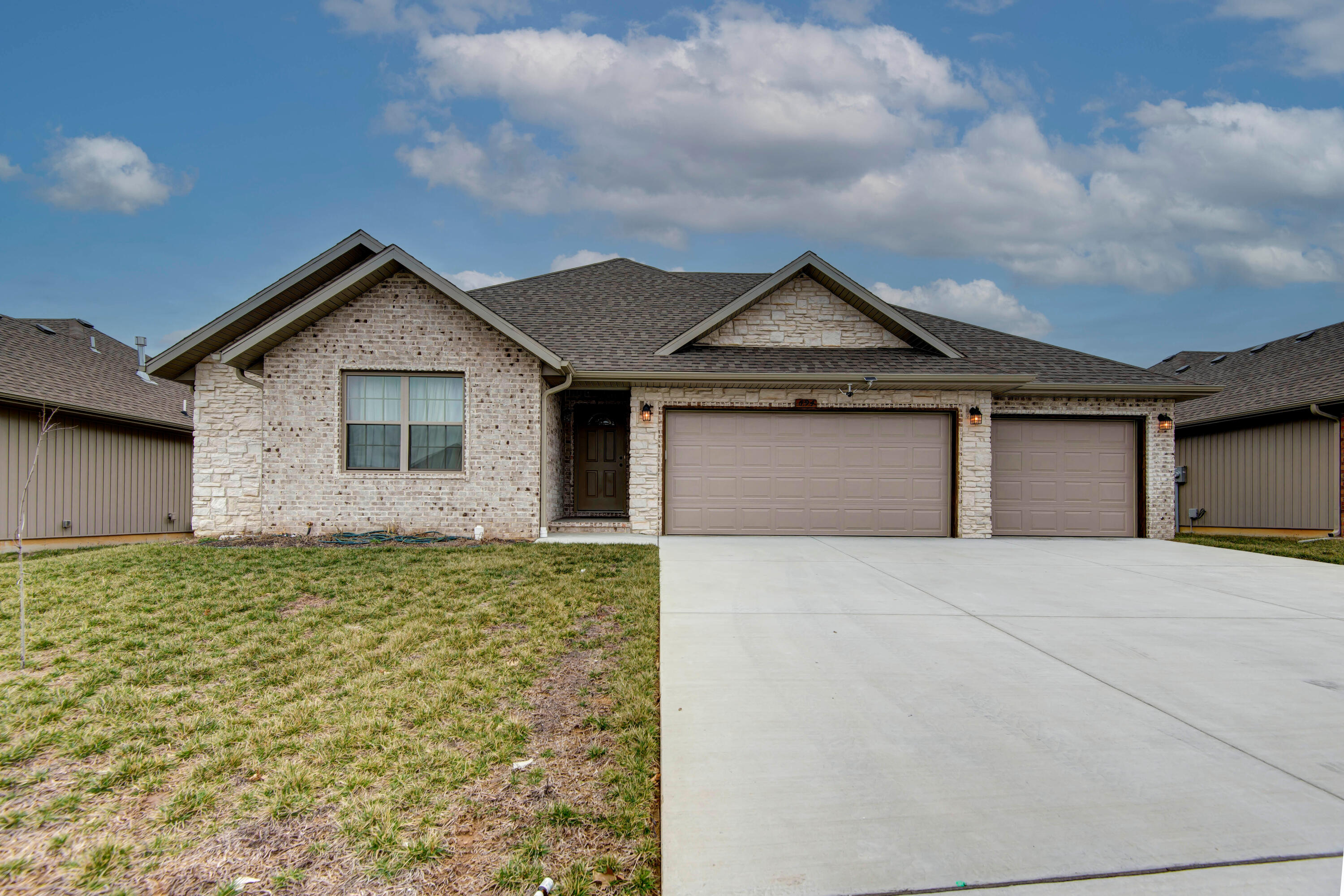 Newer home in Nixa with 3 bed, 2 bath and 3 car garage with full brick and stone front! Shiplap fireplace, granite counters, stainless steel farm sink, nice size pantry. Open floor plan and much more.  Great location, Nixa Schools.  Dont miss this beautiful home.