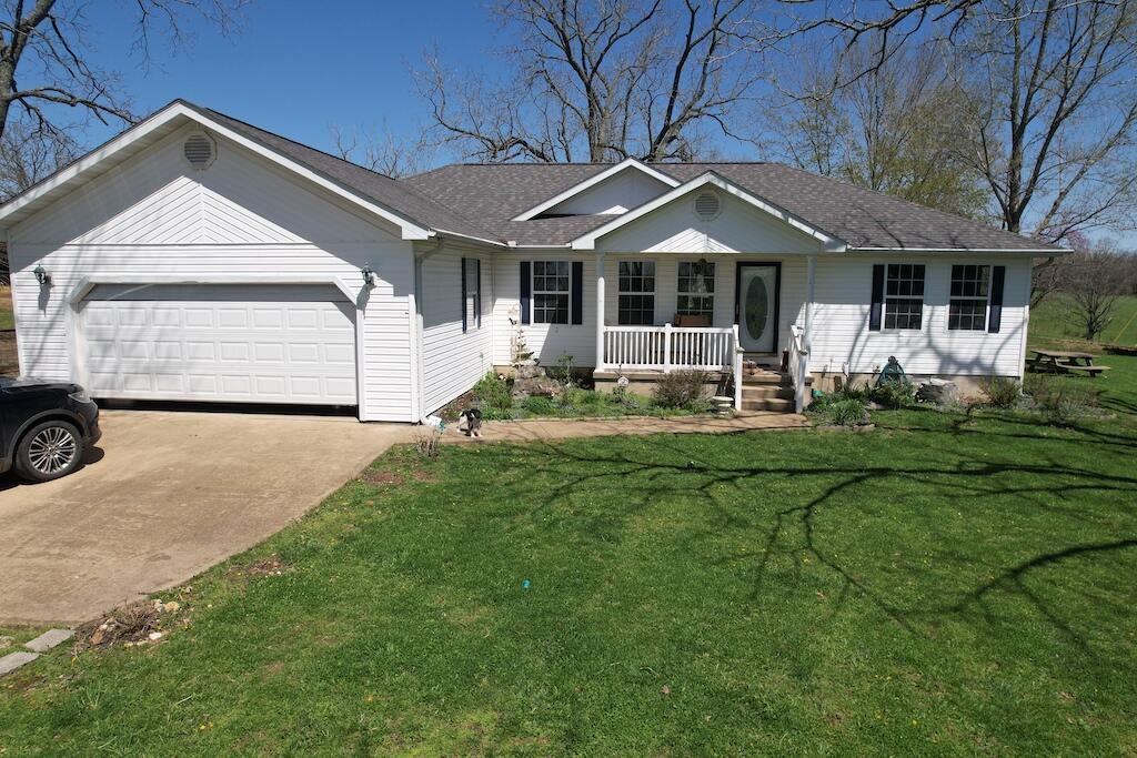 3BR/2BA Home on 80 acres mostly Pasture/HayCustom Oak Cabinetry w/Quartz Counter tops and Stainless Steel appliances. Large rooms, park-like views out the double pane windows, washer and dryer included. Covered concrete porches, attached garage and recent replaced roof with Dimensional shingles. Nice yard with mature trees and landscaping. 4 ponds multiple hydrants, Perimeter and cross fencedPipe fencing and corners with cattle panels and mix 5 strand barb/woven wire on perimeter. 31x40 shop, 25x36 Machine Storage, 30x80 Hay Barn, 40x40 Hay/Horse Barn two 10x16 storage sheds. Cross fenced into 6 parcels, 13-15 acres of woods. All the land is gently rolling with good fencing, pastures are kept up to soil test and have excellent stand of grass, mostly fescue with some clover mixed in.