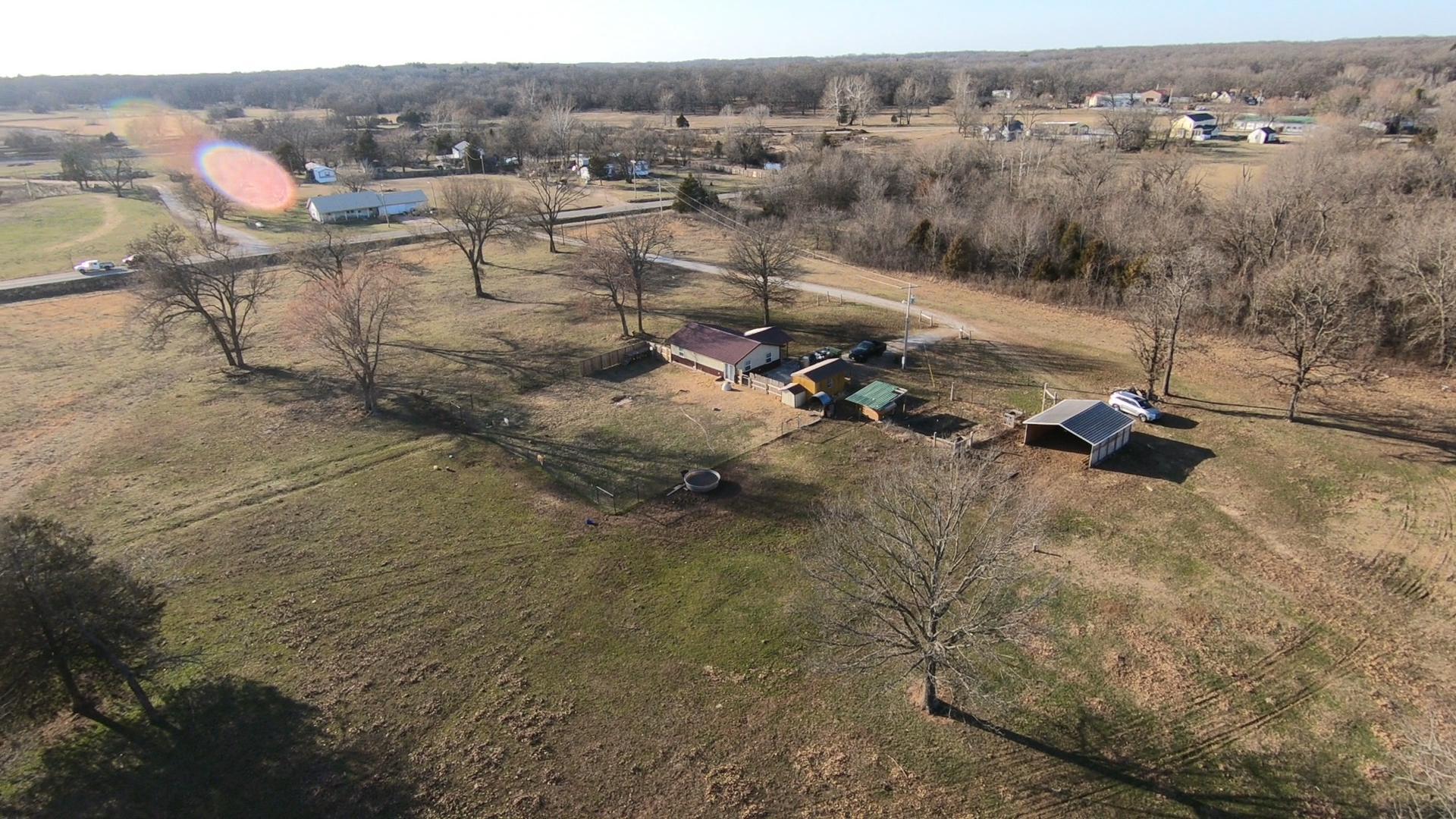 Enjoy the many possibilities with this property. Prefect location to build your dream home just past the lake secluded in the NE corner, subdivide, or create an Airbnb out of the 2 bedroom field hand cabin. Plenty of space to keep you busy or enjoy the stocked lake. This property has maintained many cattle, & horses. It also has a couple of wells, hay barn, stocked lake, pond, cross fully fenced and cross fenced for livestock.