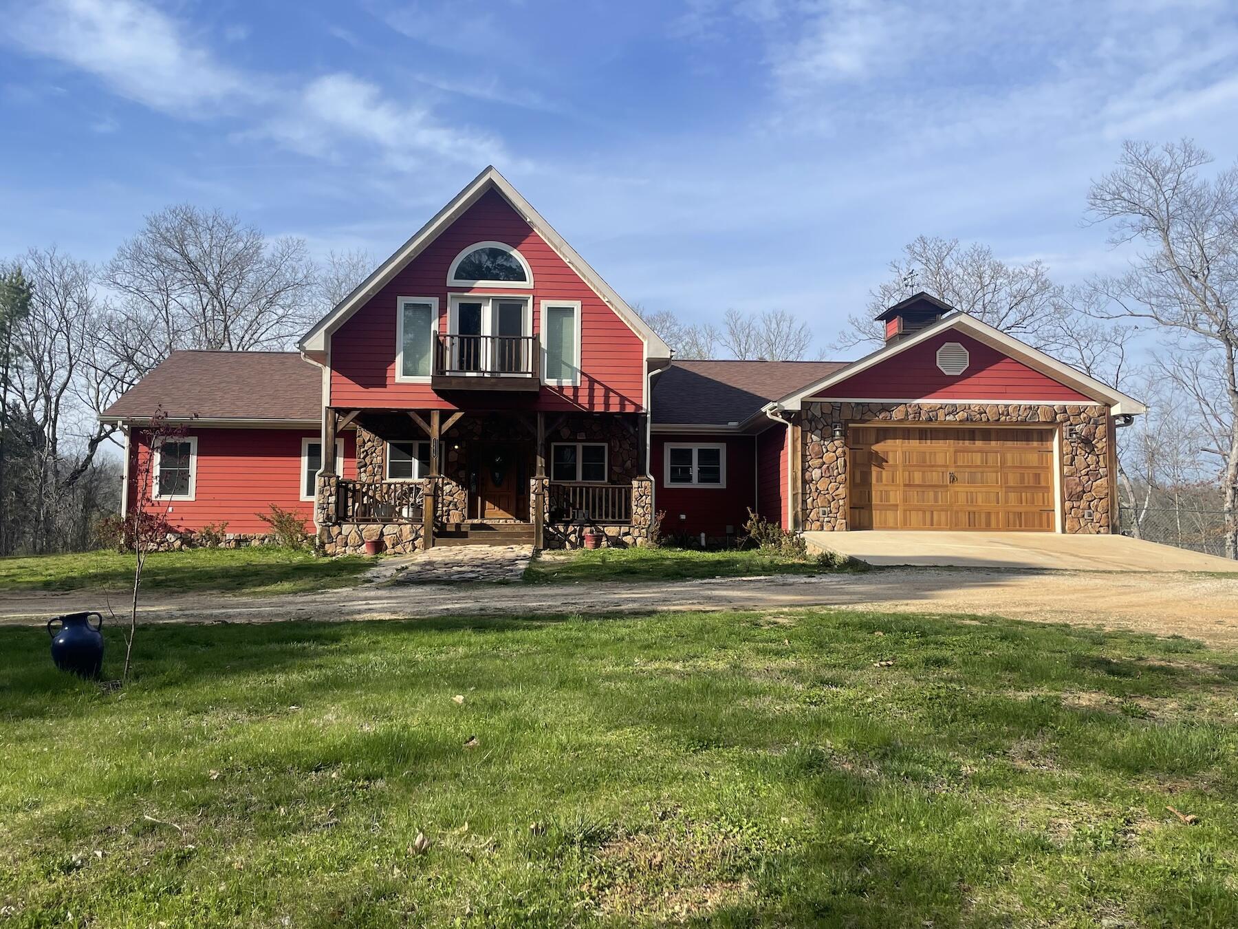 This stunning 11-acre, 6-bedroom, gated entry property is a dream come true for anyone looking for a luxurious riverfront retreat. Located on the Jacks Fork River in Eminence, Missouri, this property boasts breathtaking riverfront views. The spacious living area features a floor-to-ceiling beautiful stone fireplace and large windows that allow natural light to flood the space and provide views of the river. The house features six spacious and well-appointed bedrooms that offer unparalleled comfort and relaxation. The master bedroom has access to the back deck through French doors and a large master bathroom that includes a walk-in shower and closet, a jacuzzi tub, his and her sinks, and a spacious vanity area. The entire basement is brand new and almost complete with an additional 3 bedrooms, bathroom, utility room, kitchen, and family area. This allows for the property to be used as two separate living spaces and it has its own outside access and a door in the interior staircase. The outdoor living area is equally impressive, featuring a large deck that spans the rear of the home and offers stunning views of the river and surrounding landscape. The property also features private river access that allows for swimming, kayaking, and fishing. The surrounding landscape is pristine, with lush forests that provide the perfect amount of privacy for its convenient location in Eminence. The property is well-maintained and move-in ready, providing the perfect opportunity for you to make it your own. Don't miss out on the rare chance to own this stunning riverfront property and experience the joys of waterfront living in the heart of Eminence, Missouri!