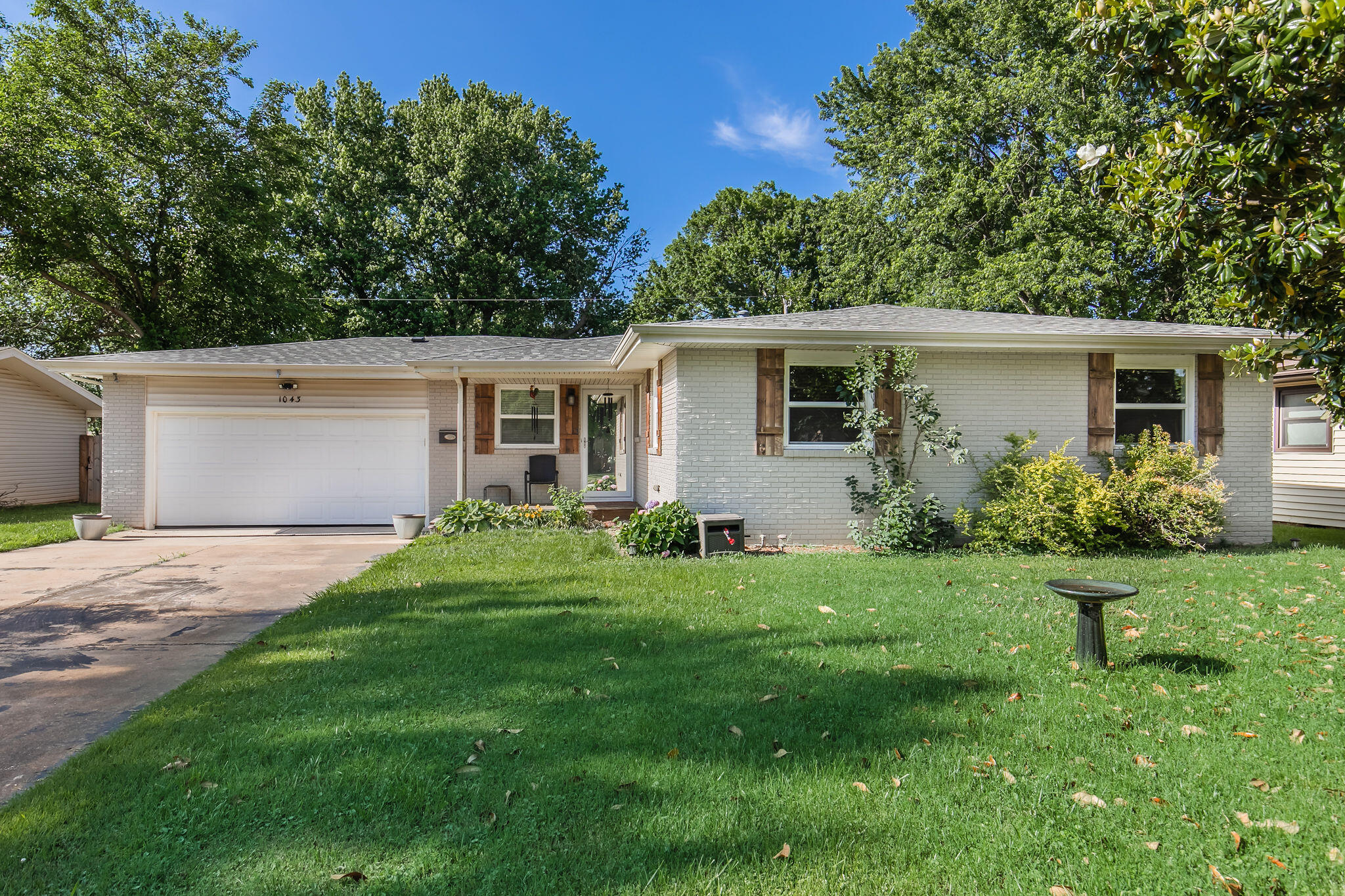 Beautifully updated 3 bed, 2 bath home!   Featuring a new roof and gutters in 2021, this 1965-built home has an open concept floor plan with hardwood and tile floors throughout!   The living room extends to the kitchen with white cabinets, stainless appliances, and a butcher block island.  The primary bedroom has an attached bathroom with walk-in shower.  There are 2 more bedrooms and a full hall bathroom.  Outside is the perfect yard for entertaining with a back deck, large privacy fenced yard, and a firepit area!  Located close to Meador Park and Battlefield Mall, call to schedule your tour today!