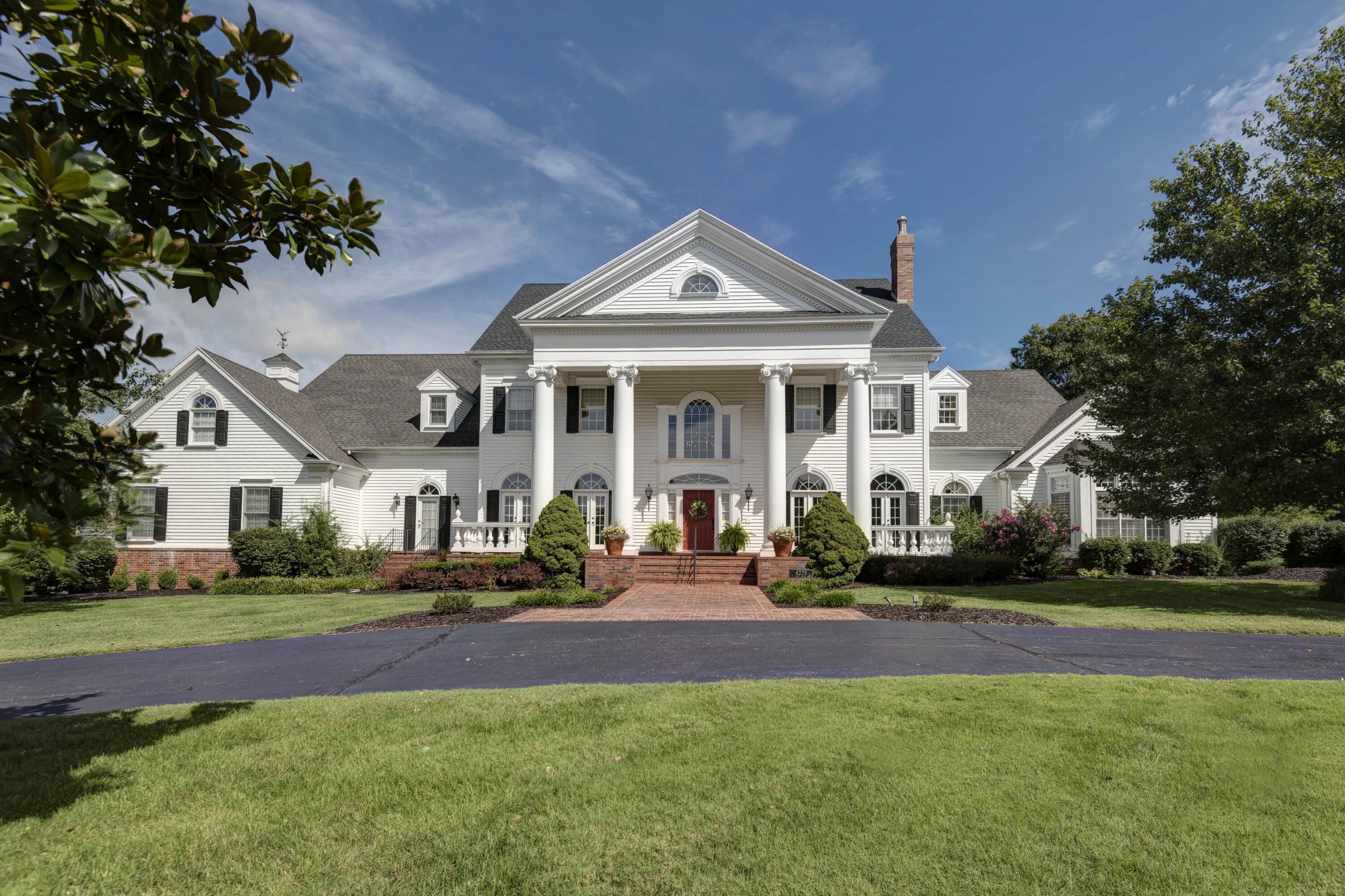 What a fantastic place, just seconds from town on 10 acres! This beautiful Georgian style home was built for this owner by Howard Bailey. More features than can be described here; a few are: custom designed in-ground pool w/changing room and pool bath, enormous kitchen and hearth room, main floor Master suite, fun basement Rec room, ground source HVAC, 5-car garage, and a circle driveway.