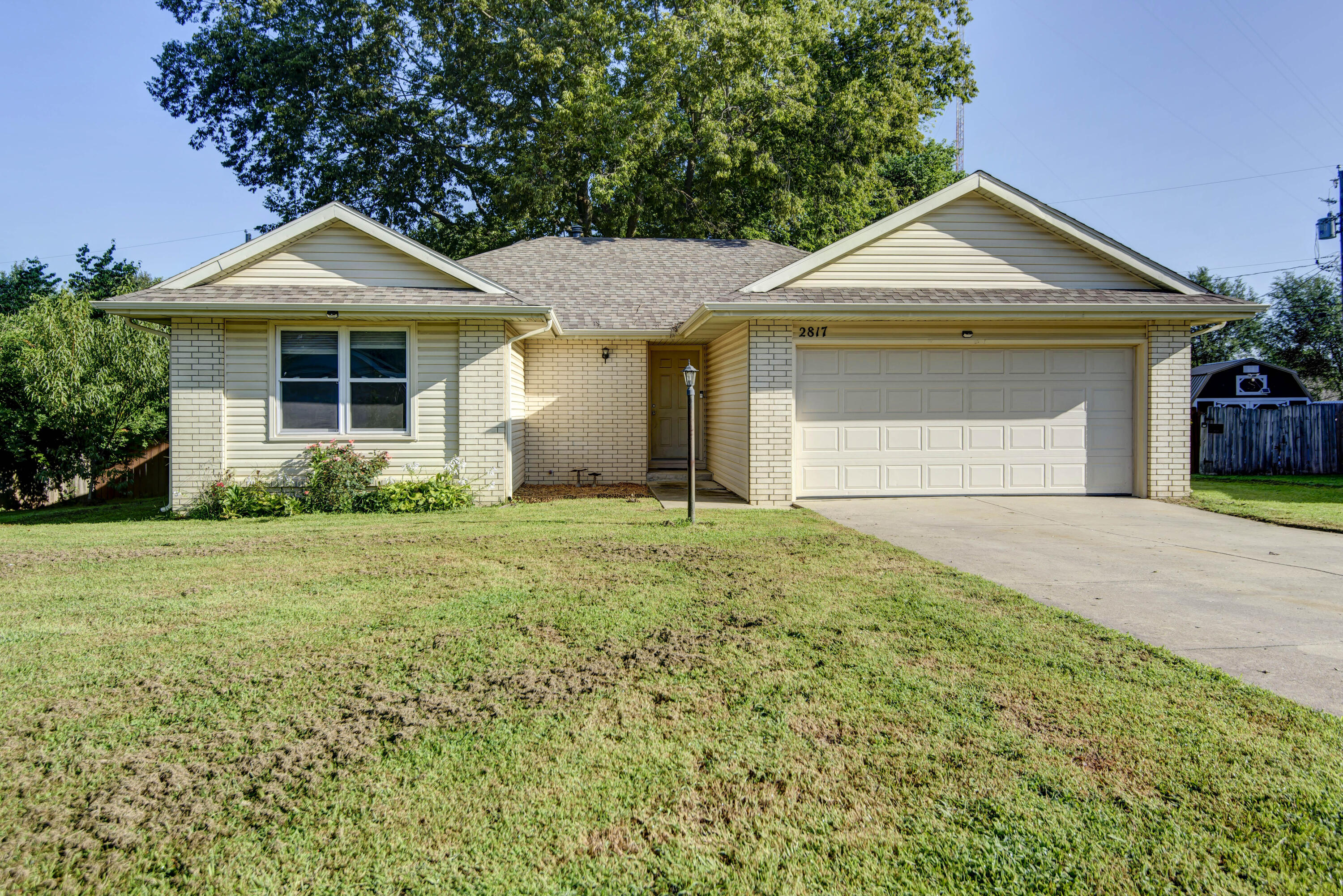 Tons of Updates, move-in ready! This 3 BR, 2 BA, approx. 1,287 sq. ft. home is situated on a quiet street in SW Springfield. Upon entering, you will see the Living Room woodturning fireplace. The Eating Area opens to the Kitchen with new stainless appliances and sink. The Master Suite has a spacious bedroom with projector and updated bath with tile shower and new glass door. 2 additional Bedrooms and full Bath with updates round out this well-appointed floor plan. Other updates include flooring and newer roof. Enjoy the outdoors from the patio or firepit area in the fenced backyard. This is one you won't want to miss!