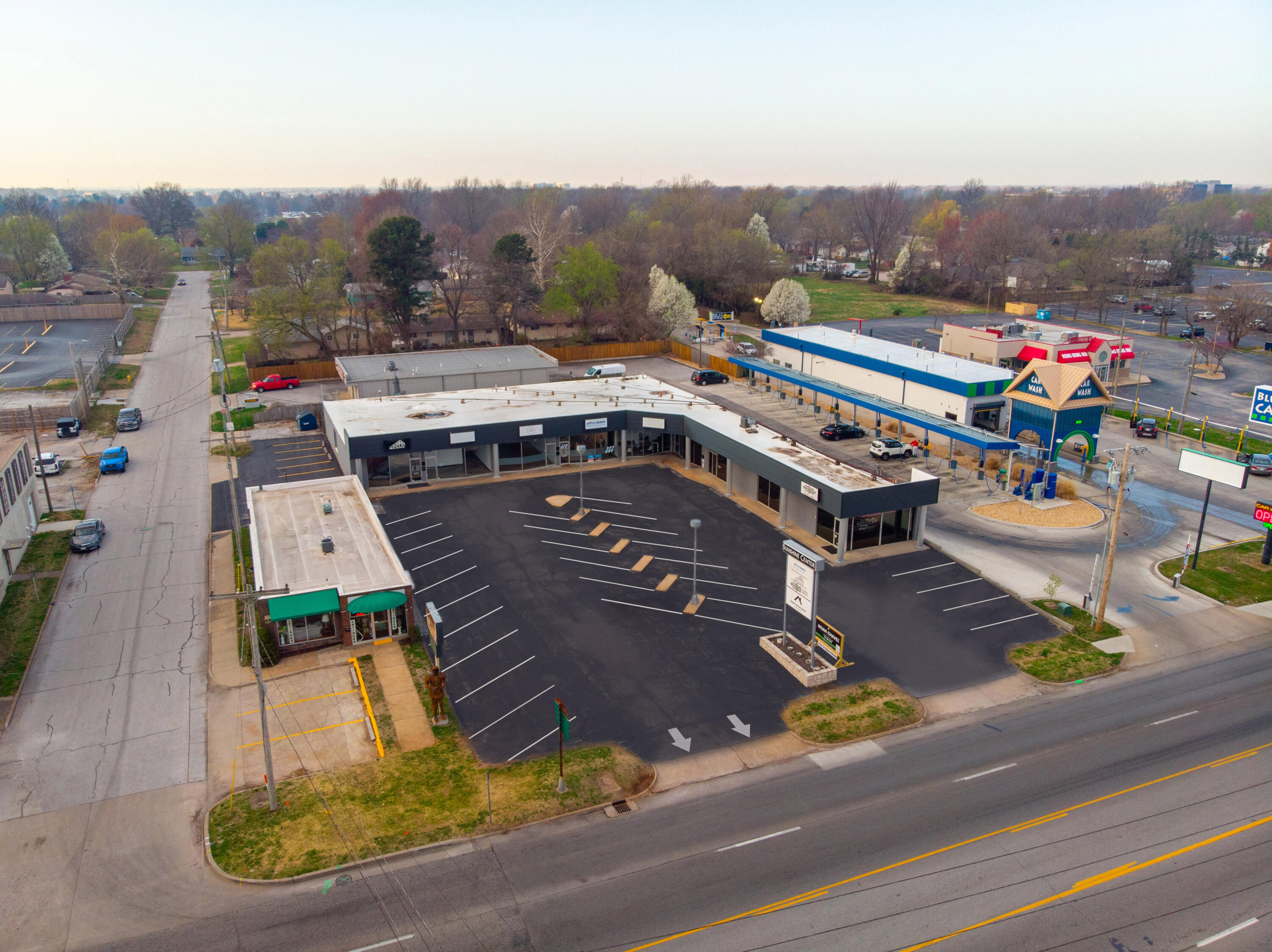 Located near one of Springfield's highest traffic intersections, Sunshine Center is a prime location for a growing business. Built in 1960, this shopping center features 8 suites, a parking lot with 28 spaces, and a pile-on sign visible from Sunshine St, and Glenstone Ave where +/-68,500 cars pass daily. Neighboring businesses include Mercy Hospital, Plaza Towers, Vib Hotel, and Hy-Vee Grocery.The sale includes Suites 1666, 1668 and 1670.  Suite may be purchased as a package for $1,050,000 or individual suites for $350,000 each.Suite 1666 features a large open retail/workspace/reception area, two private offices that lock with an electronic keypad, and a private bathroom. The suite also features a server room, a rear oversized double door, and large floor-to-ceiling front windows offering natural light.Suite 1668 features a reception area, three private offices, rear storage area, and a private bathroom. The suite also features a rear oversized double door, and large floor-to-ceiling front windows offering natural light.Suite 1670 features a large open retail/workspace/reception area, two private offices, a rear storage area, and a private bathroom. The suite also features a rear oversized double door, a utility room, and large floor-to-ceiling front windows offering natural light.