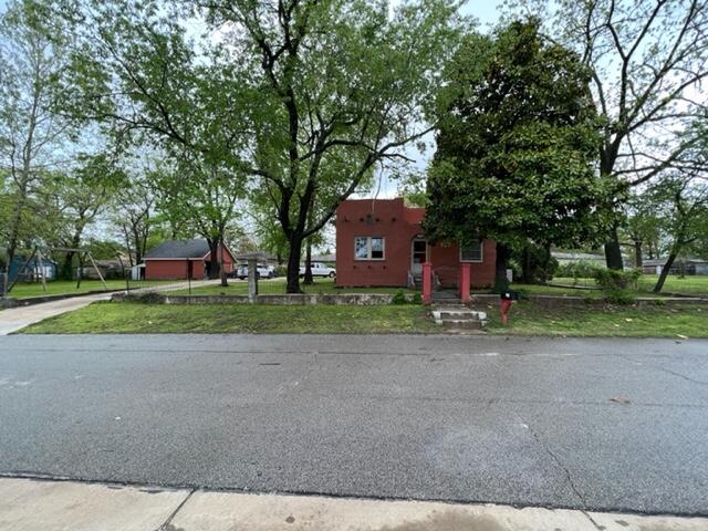 ATTENTION INVESTORS or DIY'ers! Unique Spanish style home on 3 lots in Royal Heights. Huge yard, detached 2 car garage, celler style basement with access inside home, storage shed and court yard. Home has recently had a a fire in living room. Damage is cosmetic and home is structurally in good shape. Hardwoods throughout except in kitchen. Exterior and most interior walls are concrete and stucco.