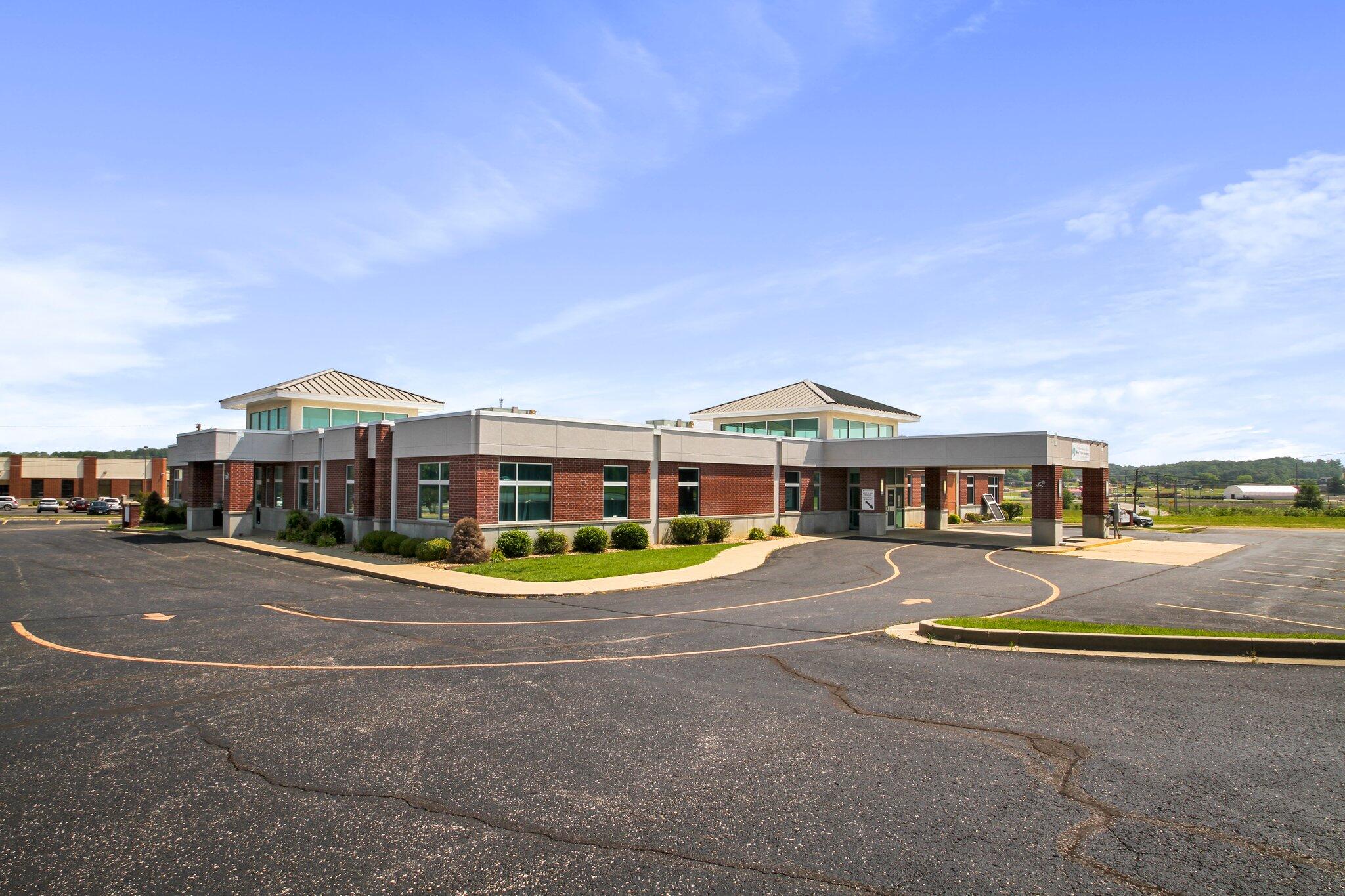 Income Producing and currently leased to our Local Hospital for $110,606/yr.  There are 1500-6000 square feet available for lease with separate entrance. This office condo is conveniently located in Independence Square right off the main thoroughfare. The growing town of West Plains has become a medical hub for all the small towns in the area and beyond by offering advanced medical services not usually found in smaller towns.  There is an opportunity for any kind of medical specialty or office space.Maintenance free with Brick and Stucco construction.  There is a condo association that manages the grounds.  Currently set up for medical, however it could be used for any type of business.West Plains has so much for a town with population of just over 12,000.  Ozarks Medical Center is a top rated hospital that recently completed a $70 million expansion and offers General and Specialized medicine with Top Rated Heart and Cancer departments. Missouri State University of West Plains has a campus of approximately 2000, offering excellent continuing education to the area and beyond. The university has their own Women's Volleyball and Men's Basketball teams and provide another level of entertainment for our residents.   There is excellent opportunity for employment in West Plains with several manufacturing plants, lots of small businesses, retail, farming, opportunities galore! West Plains is the shopping and entertainment hub of Howell County (with a population of 40,000+) and several surrounding counties! West Plains Civic Center plays host to concerts and activities year round along with local Small Stage Theatres that hosts multiple popular plays and musicals each year. We offer a large Farmer's Market every Wednesday and Saturday morning and there are many specialized and boutique stores that offer anything from fresh, specialty and deli meats to old-fashioned candy.