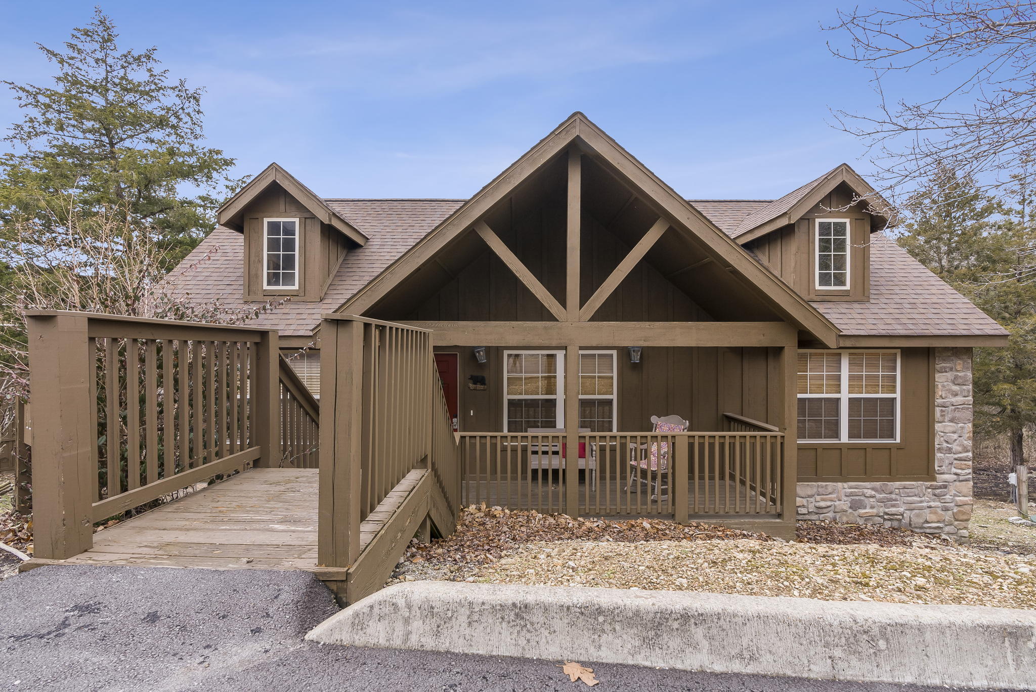 Investment Opportunity! This beautiful, fully furnished cabin is located in Stonebridge Village. Walking Distance to the Catch and Release Lake, Beach Volleyball, Infinity Pool, and Tennis Courts. Relax on a fully screened in back deck. Cabin features two master suites with jetted tubs, an open living area with vaulted ceilings and a gas log fireplace. Cabin is perfect for an investment property, full time living, or your own personal getaway.