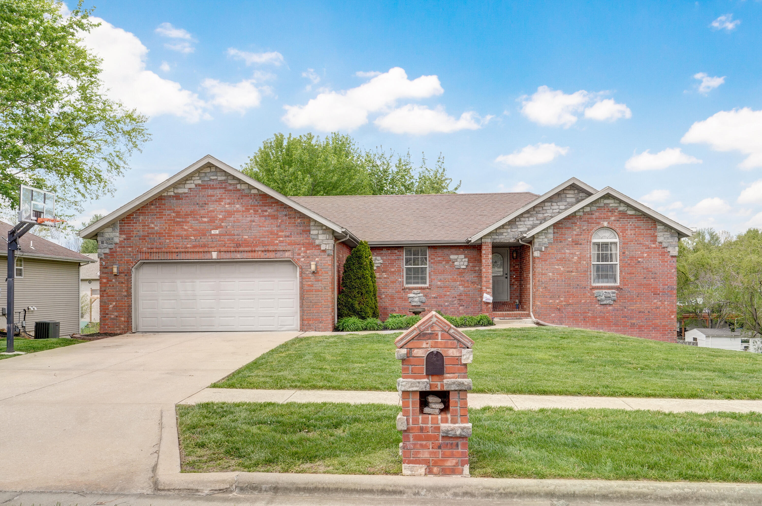 Welcome to this beautiful 5-bedroom, 3-bathroom home featuring a finished basement and located in a desirable neighborhood, offering both peace and convenience. This updated home is perfect for those looking for a spacious, move-in ready Nixa Home.As you step inside, you'll be greeted by a warm and inviting atmosphere with modern finishes and ample natural light. The main level features a large living room, perfect for entertaining guests or just relaxing.  The adjacent dining area leads to a stunning gourmet kitchen, complete with stainless steel appliances, granite countertops, and plenty of storage space. You'll love cooking in this kitchen while enjoying the beautiful view of the backyard.The main level features 3 generously sized bedrooms, perfect for a growing family or anyone who needs a home office or guest room. The primary bedroom boasts a walk-in closet and an en-suite bathroom with double vanity, soaking tub, and a walk- in shower. The additional bedrooms share a full bath with dual vanity, making mornings a breeze for everyone.The finished basement offers a versatile space that can be used as a family room, a home gym, or a home theater. The wood look tile adds to the wow factor and there's also plenty of storage space in the basement for all your belongings plus a true John Deere room for toys!Outside, you'll find a well-maintained backyard with plenty of space for outdoor activities and entertaining. This home also features a large 2-car attached garage, providing additional storage space and protection for your vehicles.This home is conveniently located near shopping, dining, and entertainment options. You'll love the quiet neighborhood setting, while still being just minutes away from everything you need.All of this in a Blue Ribbon school district!