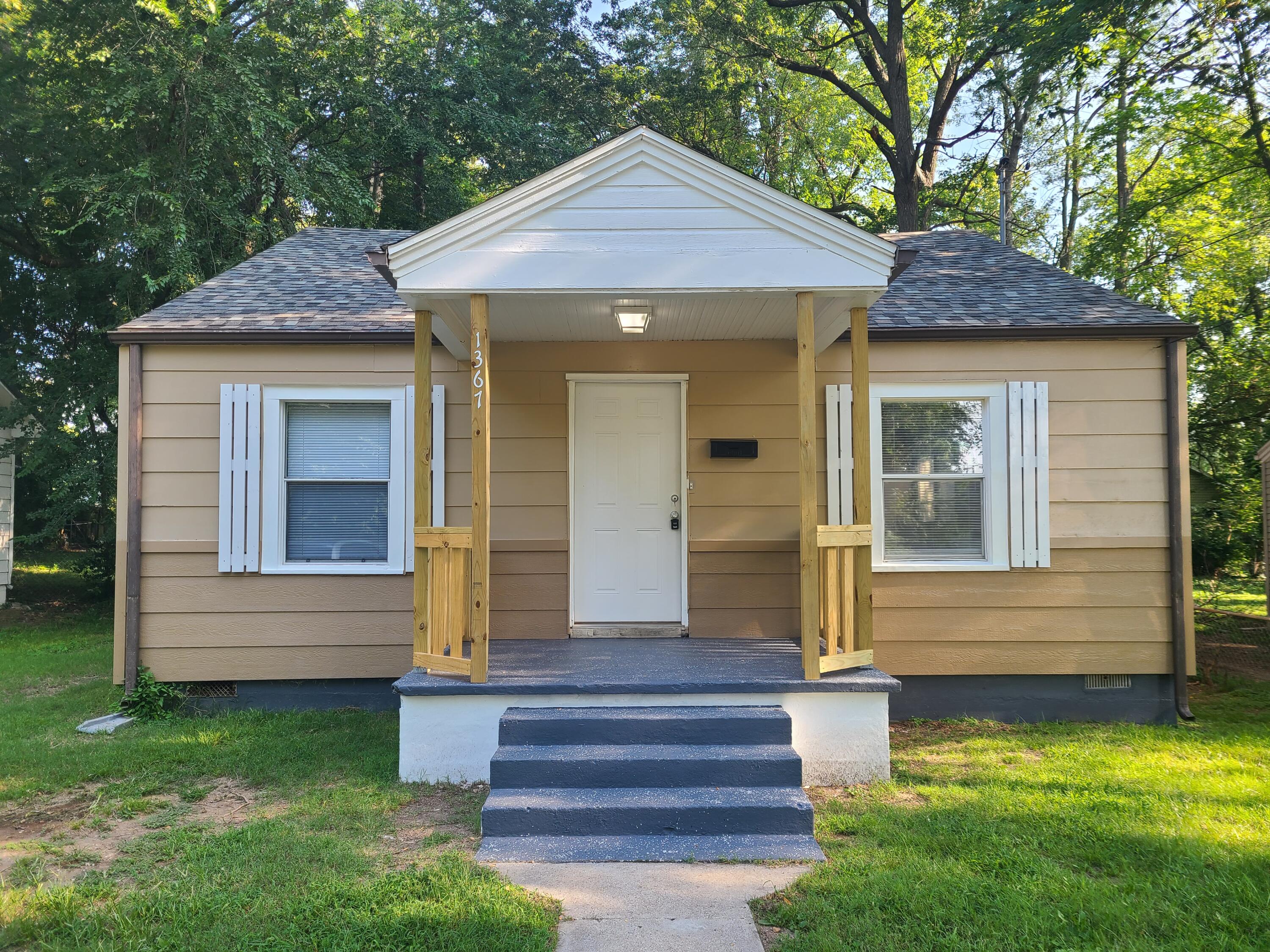A wonderful 2 bedroom, 1 bath home in an area where homes are being updated.  Newer cabinets & vinyl flooring.   New roof installed in May 2023.   Fenced backyard and great shade from tall trees.