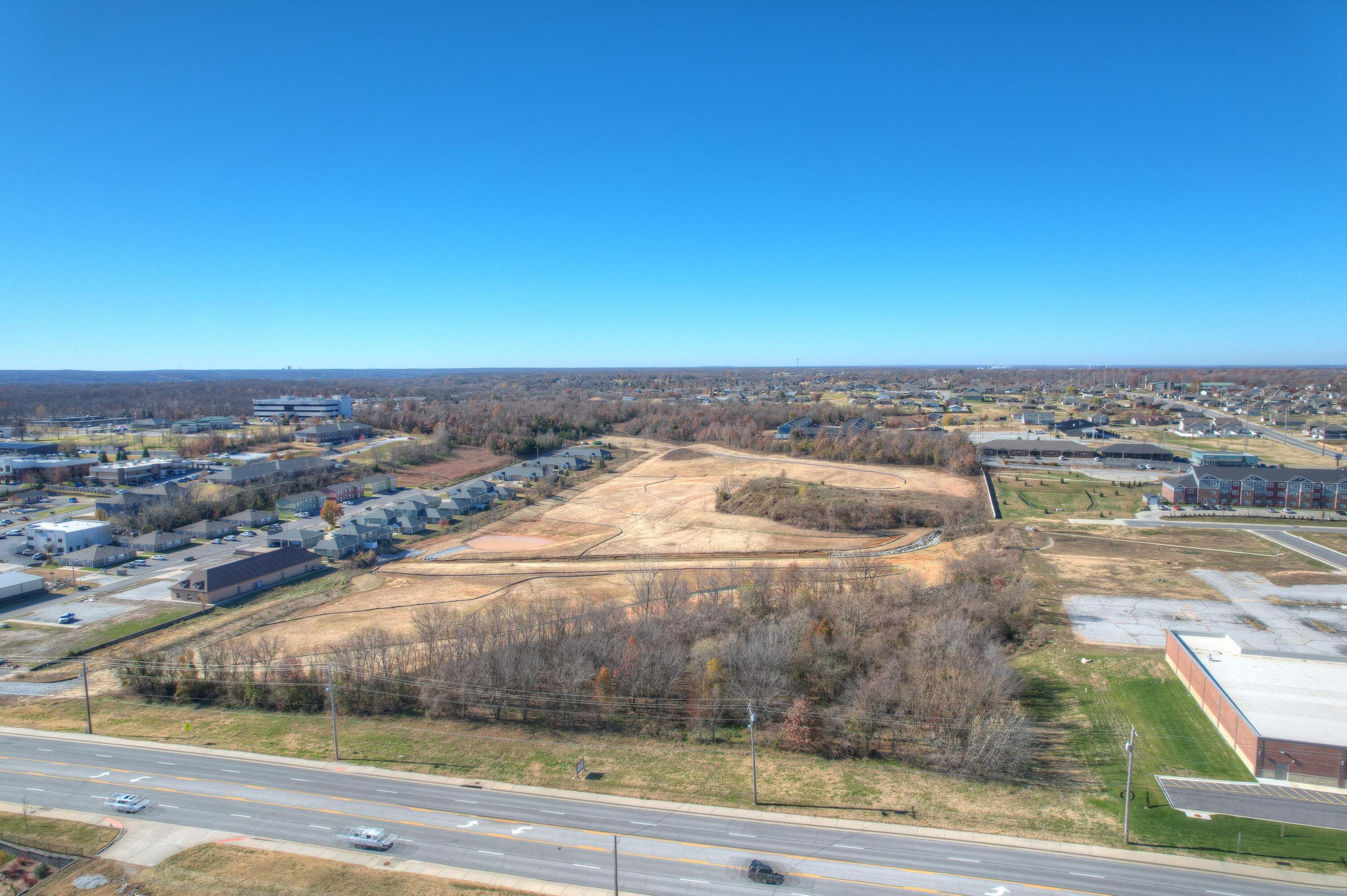 16.37 acres of prime development land in rapidly growing area. Maiden Lane (McClelland Blvd). Adjacent to Aldi, KCU Medical & Dental Schools, newer apartments and veteran housing, schools and daycare facility, Wal-Mart neighborhood market, Ace Hardware and more. Recently remediated for lead by the EPA. Approximately 675 feet of frontage. Will subdivide.