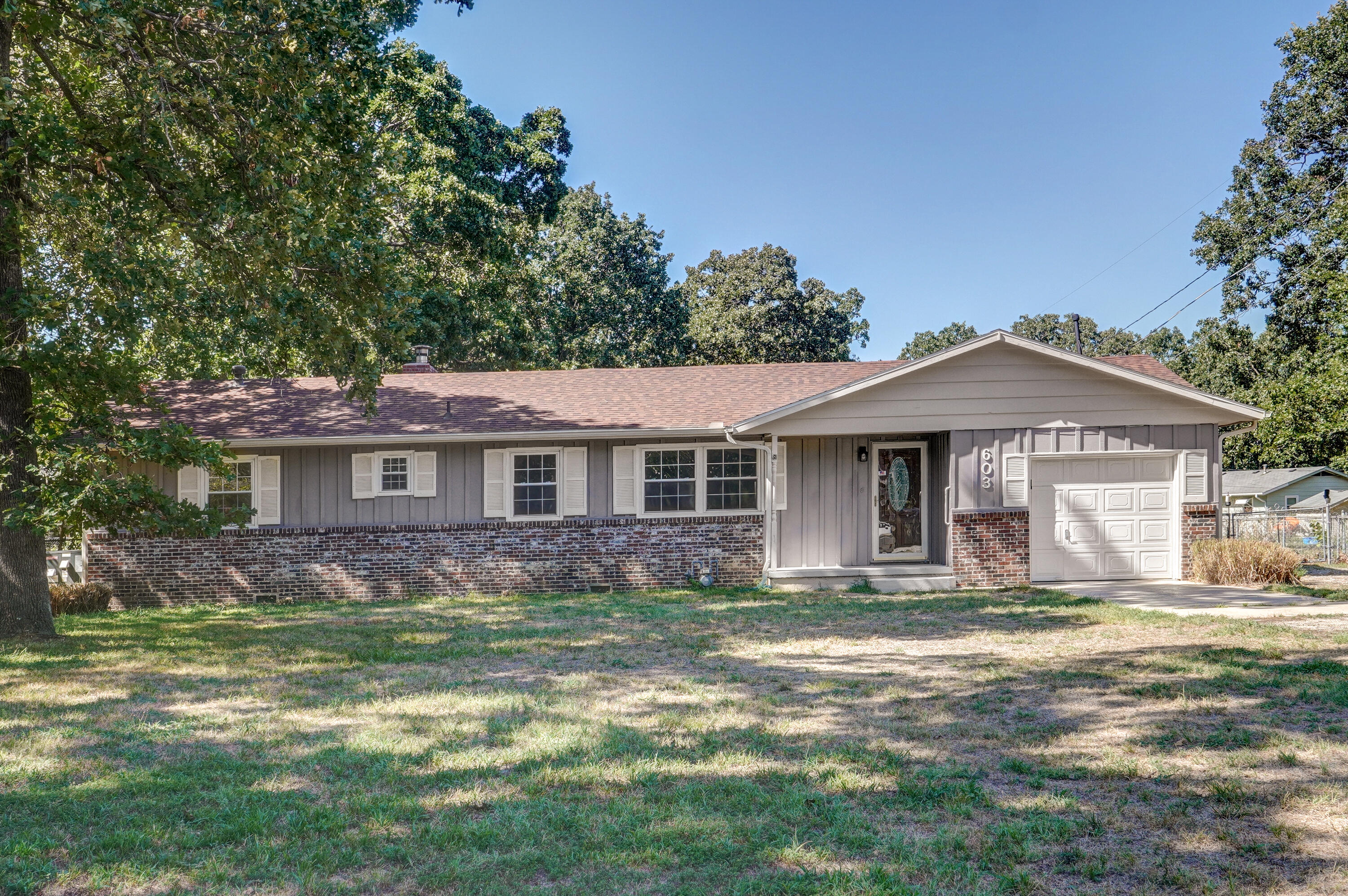 This newly updated home is ready for you to move right into.  It boast beamed Cathederal ceillings, 2 living spaces, water resistant flooring, and a roomy kitchen. The large fenced yard is great for kids to play, growing a garden and/or parking all your big 'toys',  as well as relaxing on the cozy covered patio. The roof, guttering and downspouts were replaced in 2020 Schedule a viewing today.
