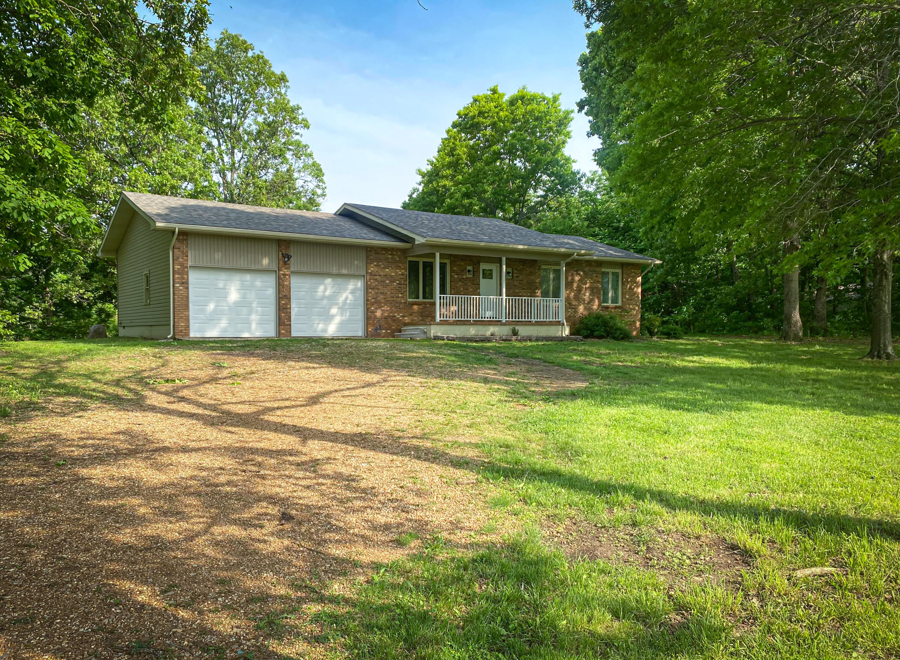 Beautifully remodeled 3 bedroom home on 3 acres with a small shop. Bolivar schools.