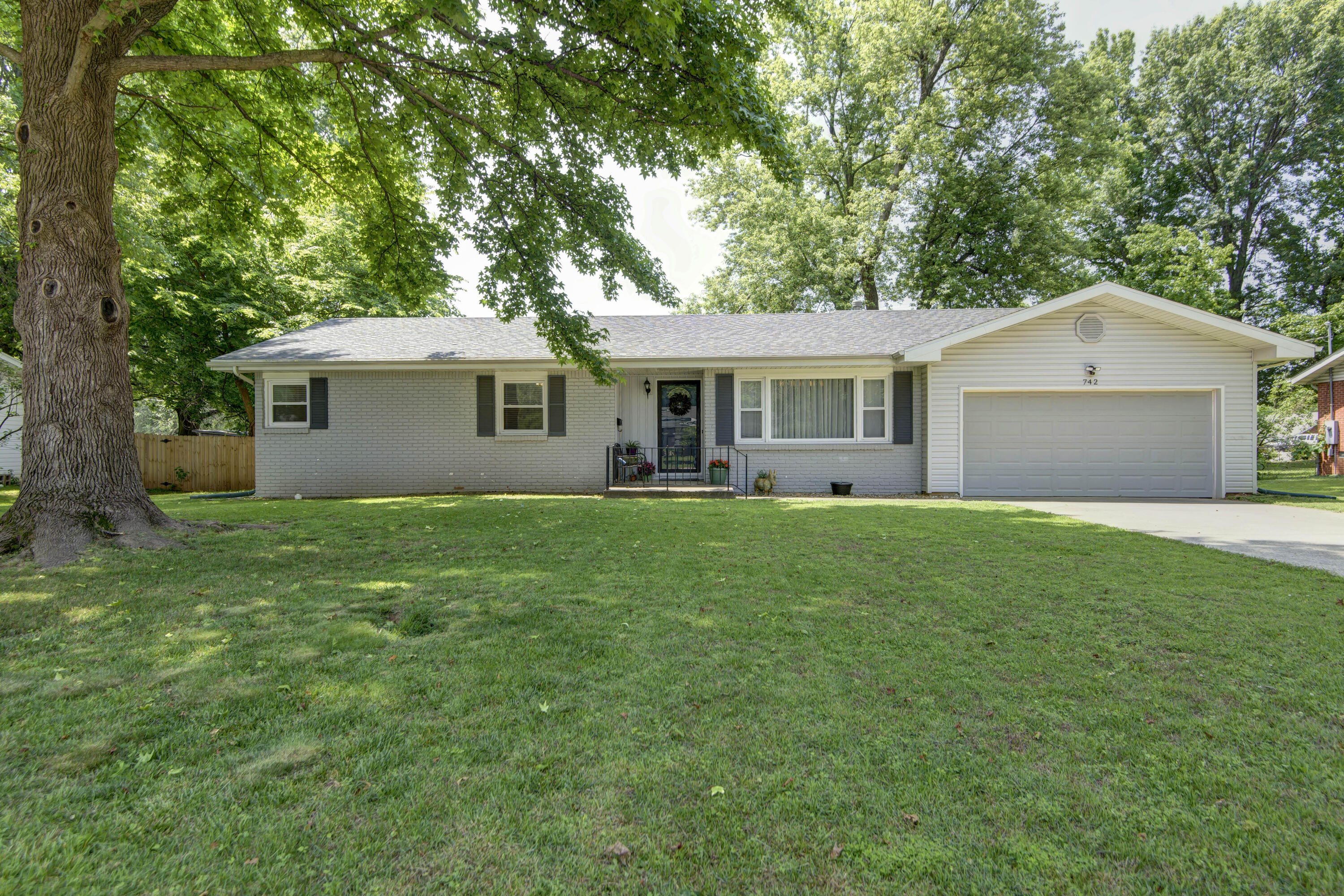 Welcome to 742 W. Sylvania, a stunning renovated home in the desirable Park Crest Village of Springfield, MO. This charming residence offers a spacious layout with 1,654 square feet of beautifully designed living space, featuring 3 bedrooms and 2 bathrooms.Step inside and be greeted by the elegance of wood flooring flowing throughout the inviting living area, adding warmth and character to the home. The kitchen boasts sleek granite countertops, providing a perfect blend of style and functionality for all your culinary endeavors.One of the highlights of this exceptional home is the delightful sunroom, offering a serene retreat where you can bask in natural light and enjoy panoramic views of the surrounding neighborhood. Whether you choose to relax with a book or entertain friends and family, this versatile space is sure to impress.The HVAC system, a vital component for comfort, has been thoughtfully updated and is approximately 2 years old, ensuring efficient and reliable climate control throughout the seasons.Beyond its aesthetic appeal, this home is in impeccable condition, a testament to the care and attention given to its renovation. From top to bottom, every detail has been meticulously crafted, creating an atmosphere of comfort and sophistication.Located in the sought-after Park Crest Village, this property offers a fantastic community setting with convenient access to amenities, shopping, and dining options. Enjoy the best of Springfield living in a peaceful neighborhood known for its tranquility and neighborly charm.Don't miss out on the opportunity to make 742 W. Sylvania your new home. Schedule a showing today and experience the perfect combination of modern upgrades, classic design, and an unbeatable location.