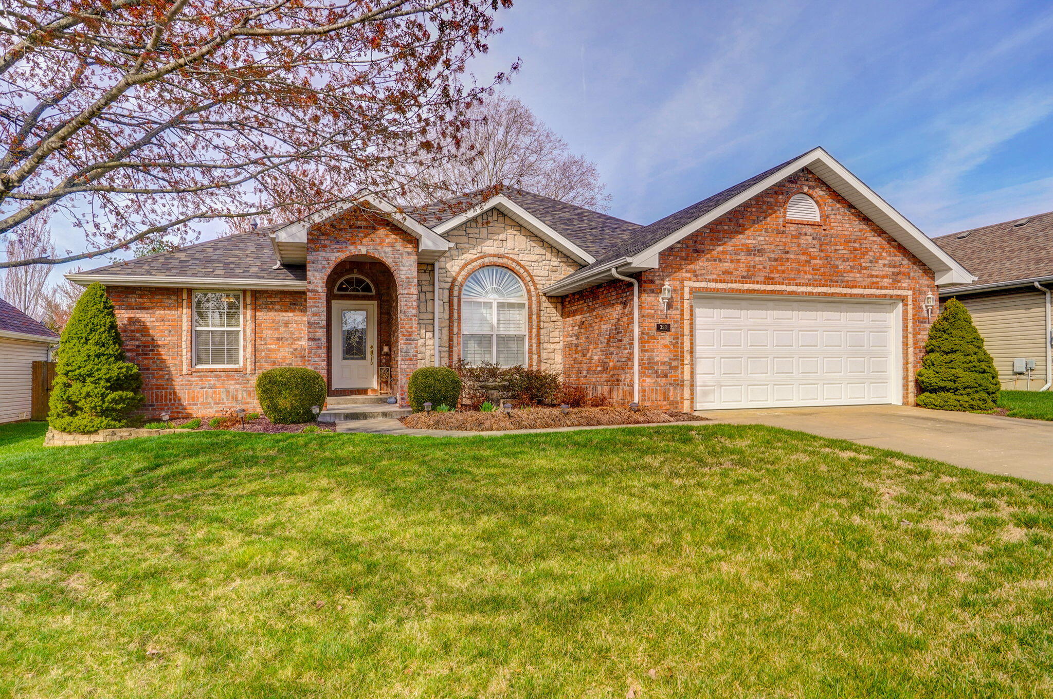 Gorgeous 1 level, 1 owner, custom built home with new roof & newer HVAC, extensive hardwood flooring, an updated kitchen including new quartz countertops, subway tile backsplash & high end stainless appliances and even a coffee station, all open to the large hearth with expansive windows overlooking the private & serene back yard and covered deck.  The quartz countertops continue into the bathrooms & laundry room.  See thru fireplace from formal living to hearth/dining/kitchen area. Beautifully maintained home ready for new owners.