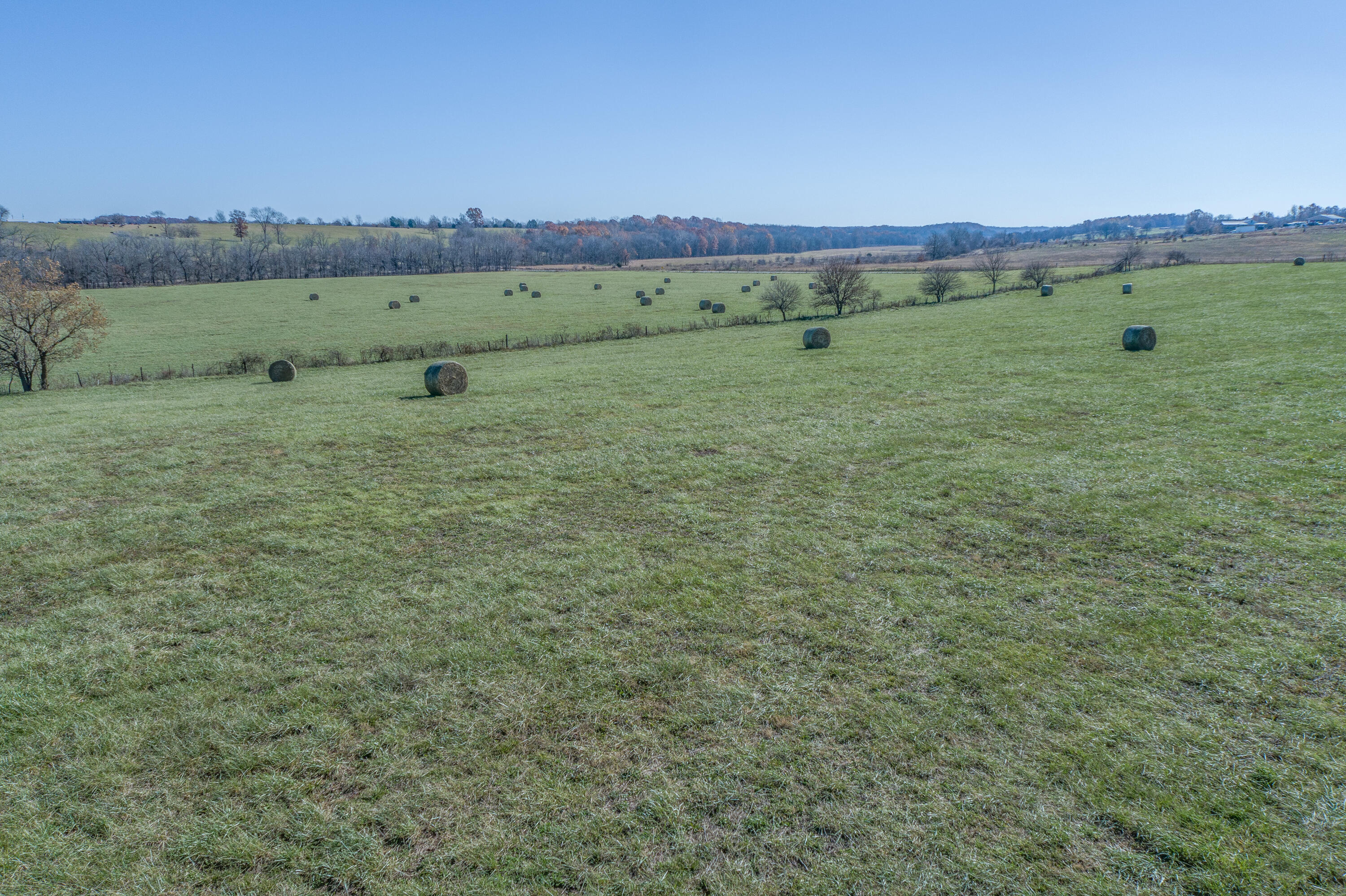 This Great property is located just South of Billings on Hwy M and offers 30+/- acres of open, gently rolling land that would be a great spot for a hobby farm or multiple homes. With road frontage on 2 sides the options are endless. Enjoy the county feel with views in all directions, a pond and barn while still being close to town.