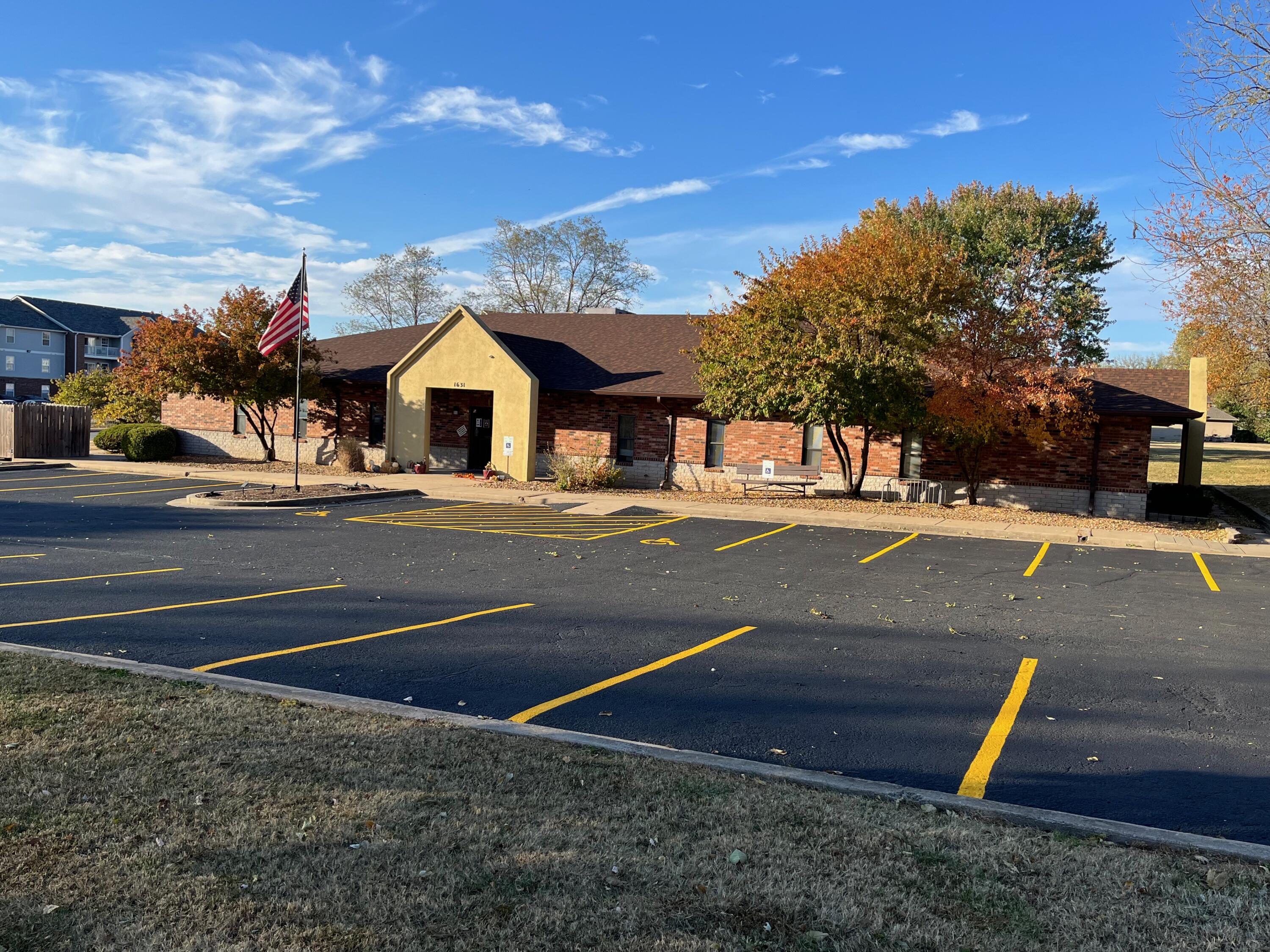 Excellent investment opportunity long term 30 year tenant. This 7076 all brick freestanding building sits on a 1.49 acre tract which is conveniently located 1 block east of Kansas Expressway. Interior consists of  6 offices, conference room, 3 classrooms, full sized kitchen, dining room and library. Currently leased to State of Missouri Social Services, which has occupied the building from when it was built (1993).New 5 year lease. Interior finishes: dropped ceiling with grid lighting, sheet rock painted walls, carpet, VCT flooring, & 2 multi stall restrooms with showers. Utilities are  forced air gas heat, electric central air conditioning, city water & sewer. Exterior paved parking are 23 spaces with 2 curb cuts. Concrete paved basketball court in the rear. New roof and gutters installed March 2021! Parking lot sealed and striped October 2022. Lease information provided to qualified buyers upon receipt of NDA.Property shown to qualified buyers by appointment only. Please do not disturb tenants.Buyer & Buyer's Agent to do own due diligence as to any information and document needed. Information within the listing has been provided but is not guaranteed.