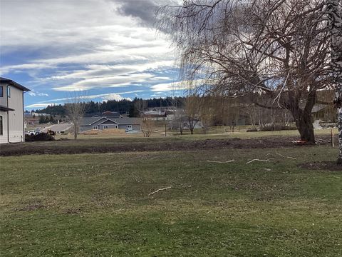 Photo of 401 White Fox Run, Polson, MT 59860 (MLS # 30065939)