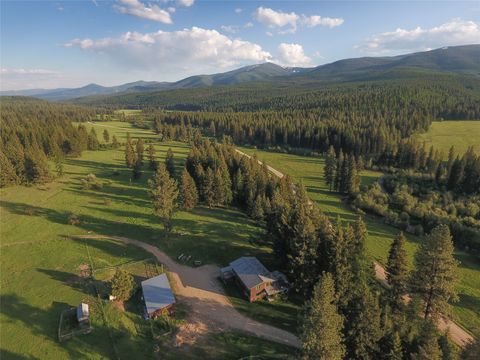 Photo of 31200 Ninemile Road, Huson, MT 59846 (MLS # 30041610)