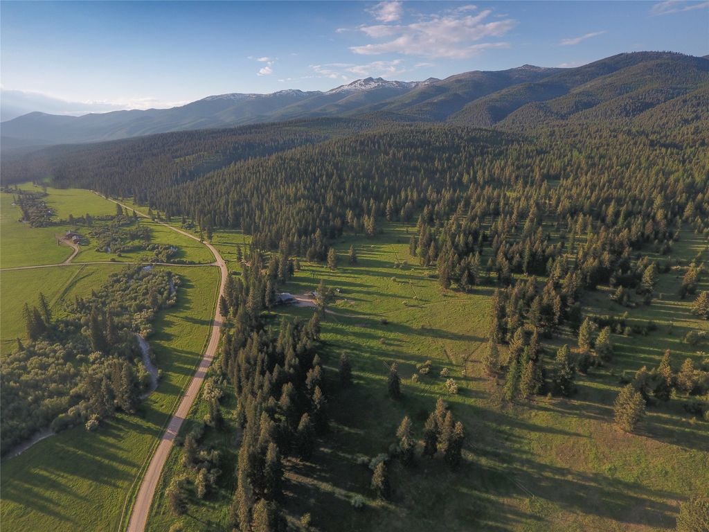 Photo of 31200 Ninemile Road, Huson, MT 59846 (MLS # 30041610)