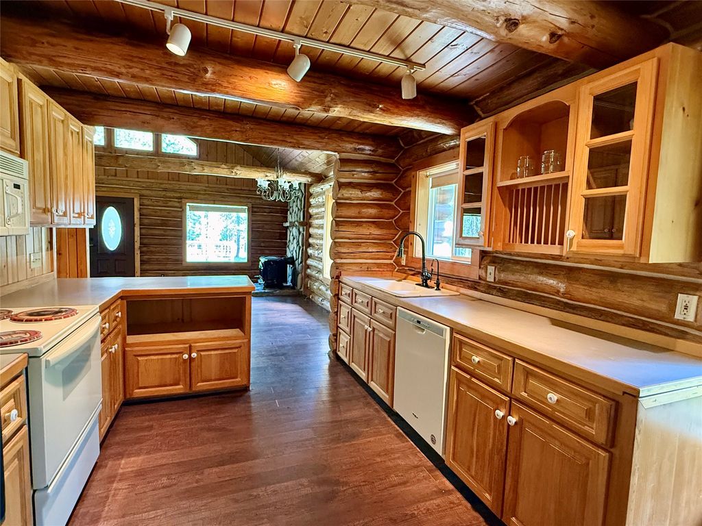 Photo of 50 Three Corners Road S, Trout Creek, MT 59874 (MLS # 30069488)