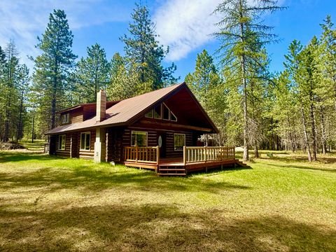 Photo of 50 Three Corners Road S, Trout Creek, MT 59874 (MLS # 30069488)