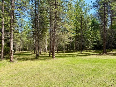 Tiny photo for 50 Three Corners Road S, Trout Creek, MT 59874 (MLS # 30069488)